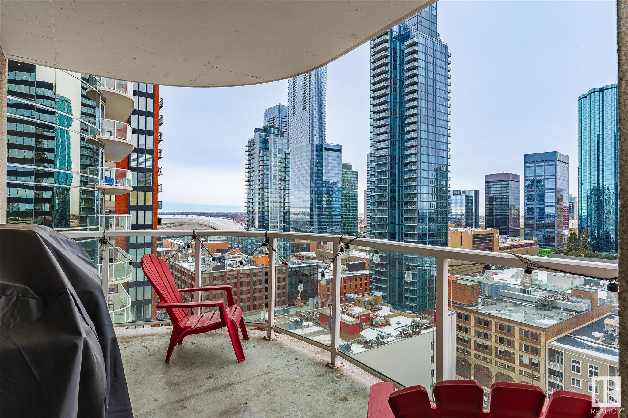 Breathtaking view of Downtown Edmonton and Roger's Place. This spacious 2 bedroom and 2 bath home has many features that include: 9 foot ceilings, renovated 2 tone kitchen with quartz counters and equipped w/ Stainless Steel appliances, open bright floor plan with great flow, two large bedrooms, upgraded luxury vinyl plank (3 months old), walk-in closet, lots of storage, and a balcony with gas line. As for the location, you will find a grocery store, LRT, locally owned shops, cafes and restaurants just steps away.  Arts, Museum, Theatre, the Winspear, all steps away. Plus the River Valley is within walking distance and minutes away. The LRT connects  you in minutes to the U of A, and NAIT, walk to Grant MacEwan. Enjoy Edmonton's Downtown Farmer's Market Saturdays from May to Oct right out your front door. Located in the sought after 104 Street Warehouse District; one of Edmonton's best streets with a WALK SCORE of 98/100, recognized as one of Canada's top Streets.