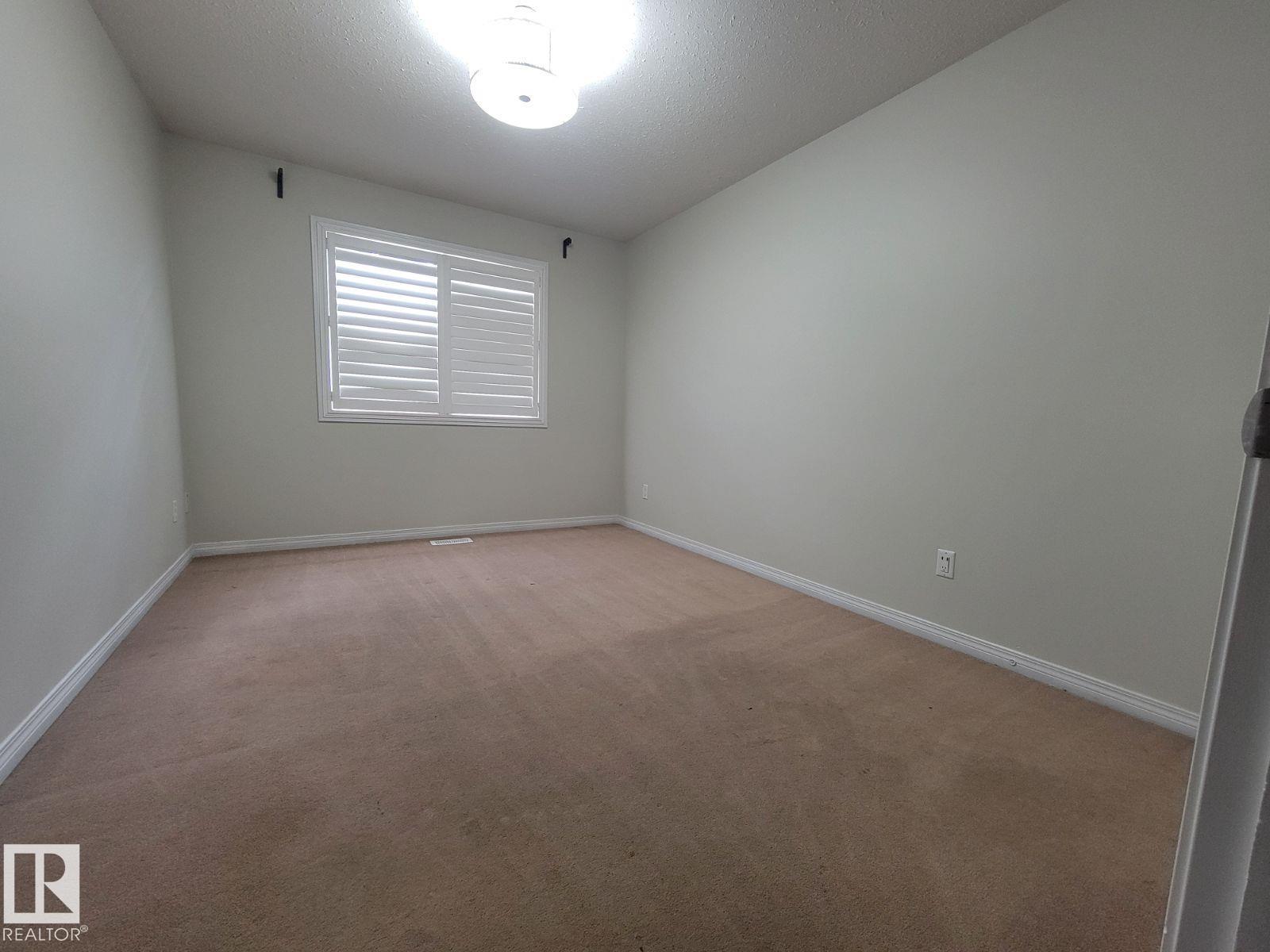 Photo 10 at 10 - 2505 42 Street NW, Bisset, Edmonton