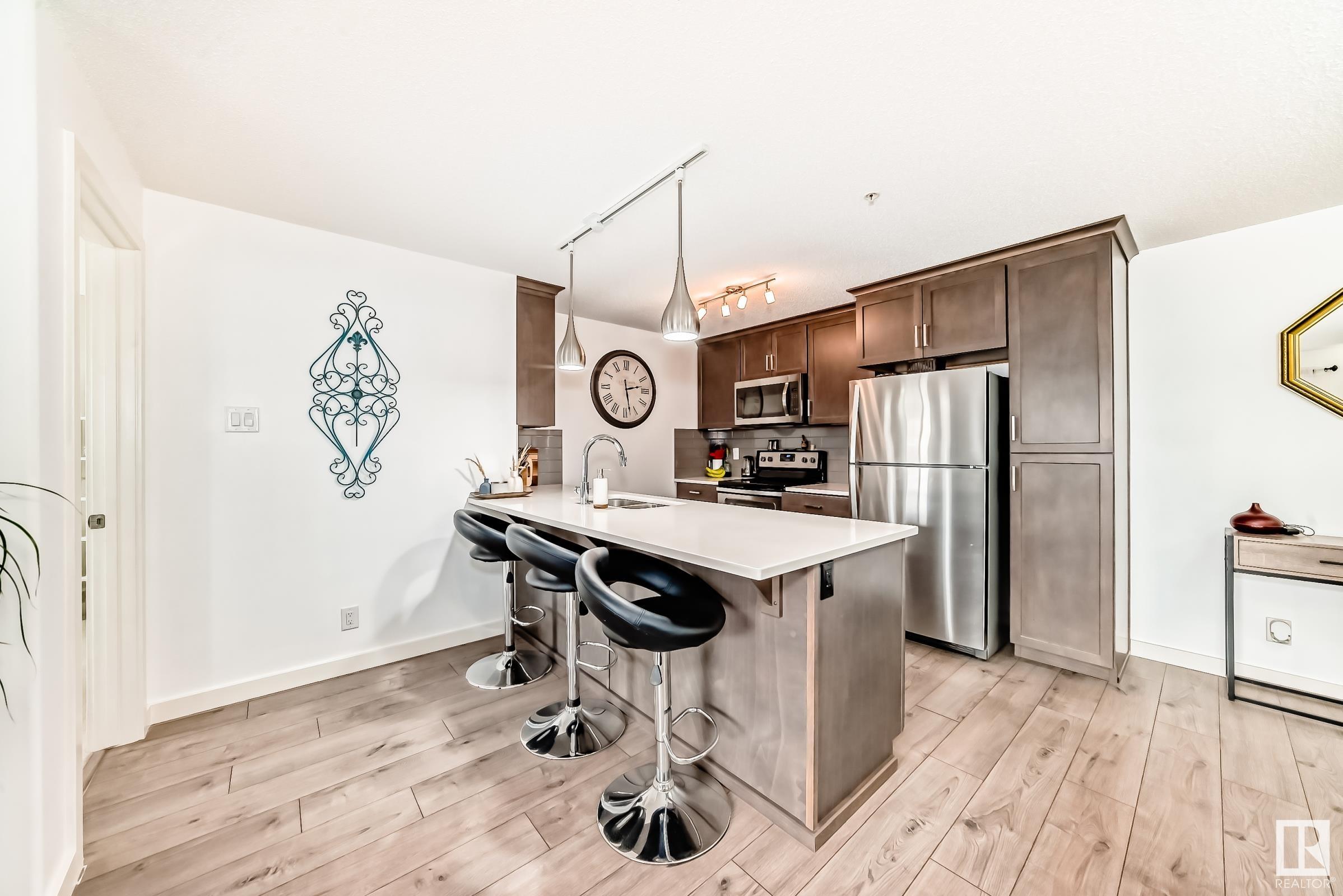 Photo 3 at 306 - 4008 Savaryn Drive Sw, Summerside, Edmonton