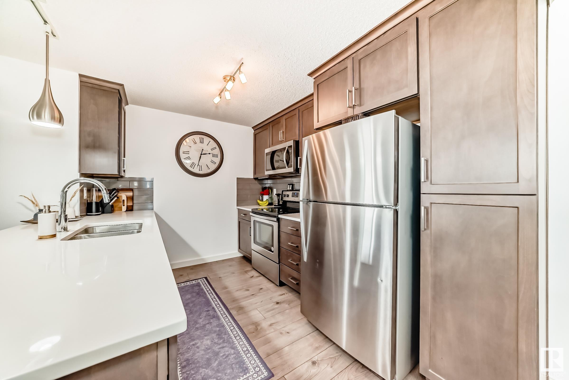 Photo 4 at 306 - 4008 Savaryn Drive Sw, Summerside, Edmonton