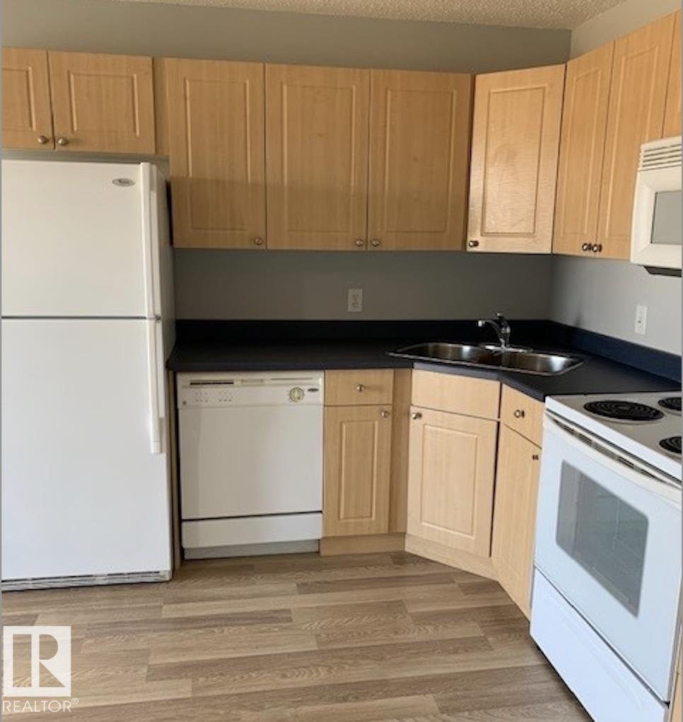 Photo 3 at 207 - 70 Woodsmere Close, Westpark, Fort Saskatchewan