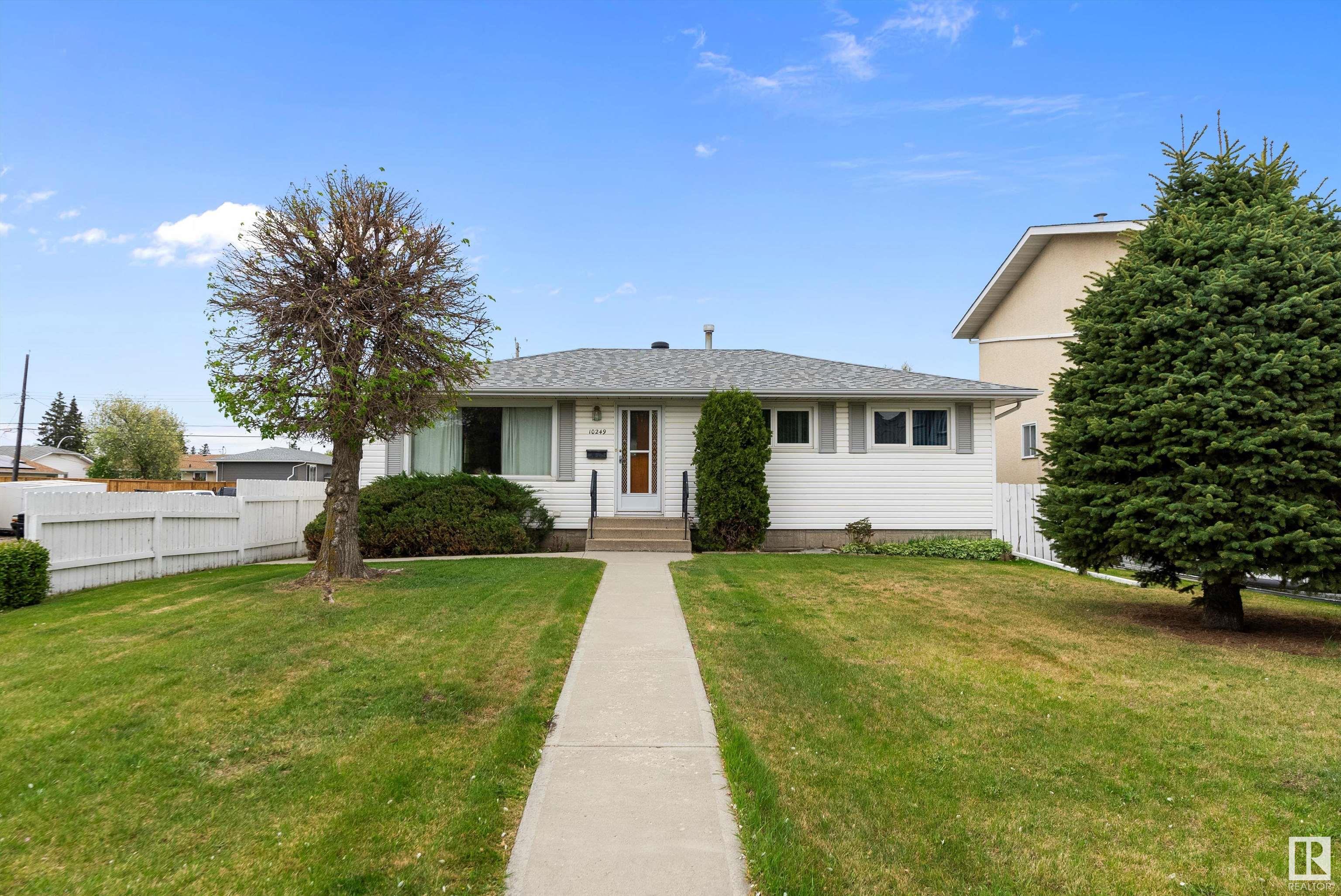 Welcome to the BEAUTIFUL ORIGINAL OWNER HOME in great condition. FULLY  DEVELOPED 1048 sq. ft. 4-bedroom 2-bathroom BUNGALOW with OVERSIZED DOUBLE GARAGE & a large 50?x150? CORNER LOT. Formal style main floor featuring a LIVING ROOM with picture window offering tons of NATURAL LIGHT & a generous sized dining room. U-SHAPED kitchen with white appliances & plenty of counterspace. 3 bedrooms plus a 4 pc. bathroom on the main floor. A BACK DOOR provides access to the yard and SEPERATE ENTRANCE to the basement completes the main floor. FINISHED BASEMENT featuring a family room, recreation room, a 4th bedroom, 2 pc. bathroom plus a laundry/utility room. LOW MAINTENANCE LANDSCAPED front and back yard, white fencing, easement on the side, concrete patio, MATURE TRRES & a 21.4?x23.5? detached garage. LOTS OF POTENTIAL to live in or build a suite/multi-unit. Well-maintained home in a great location close to DOWNTOWN EDMONTON all the amenities the area has to offer.