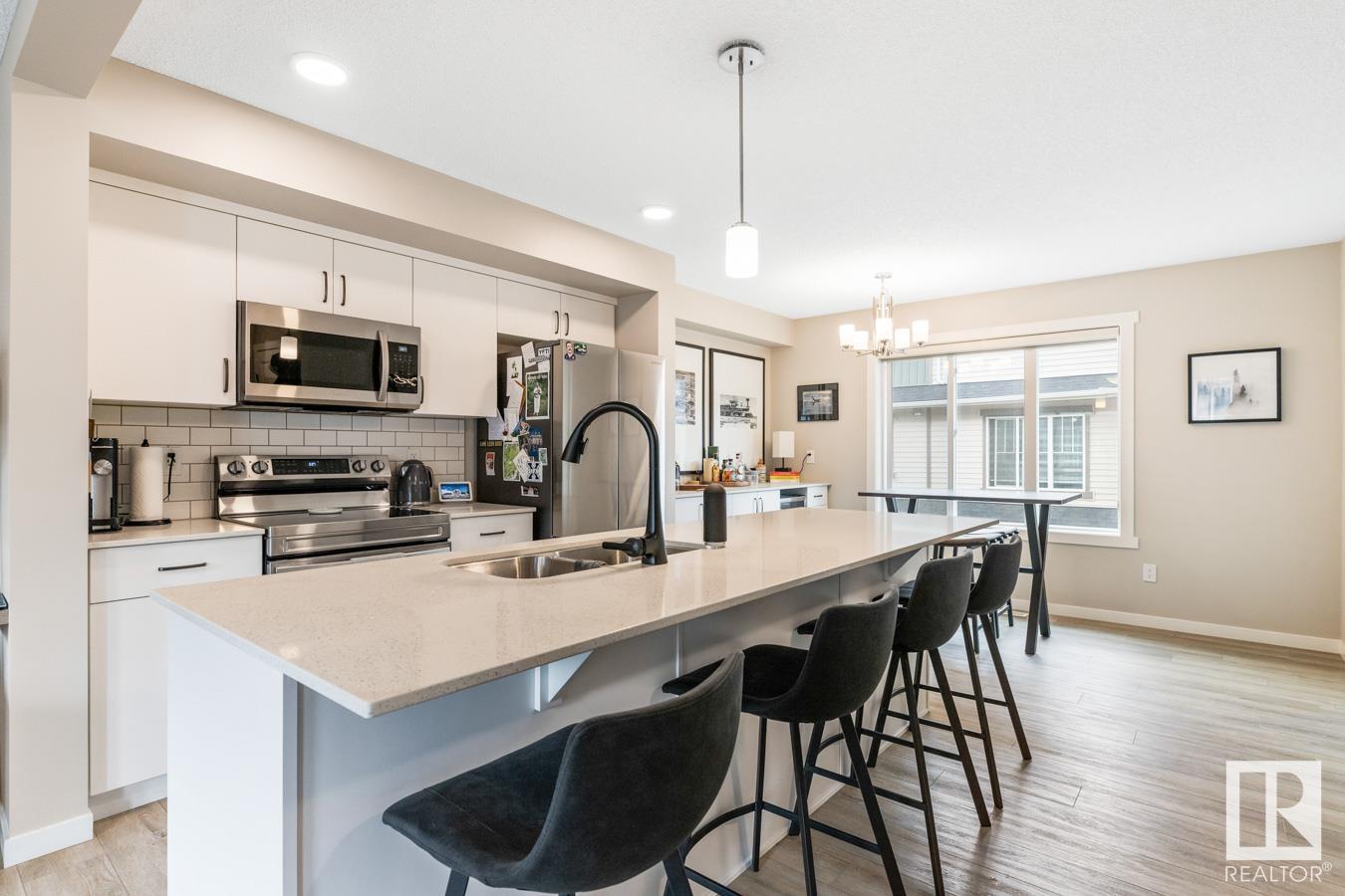 Photo 5 at 110 - 1530 Tamarack Boulevard NW, Tamarack, Edmonton