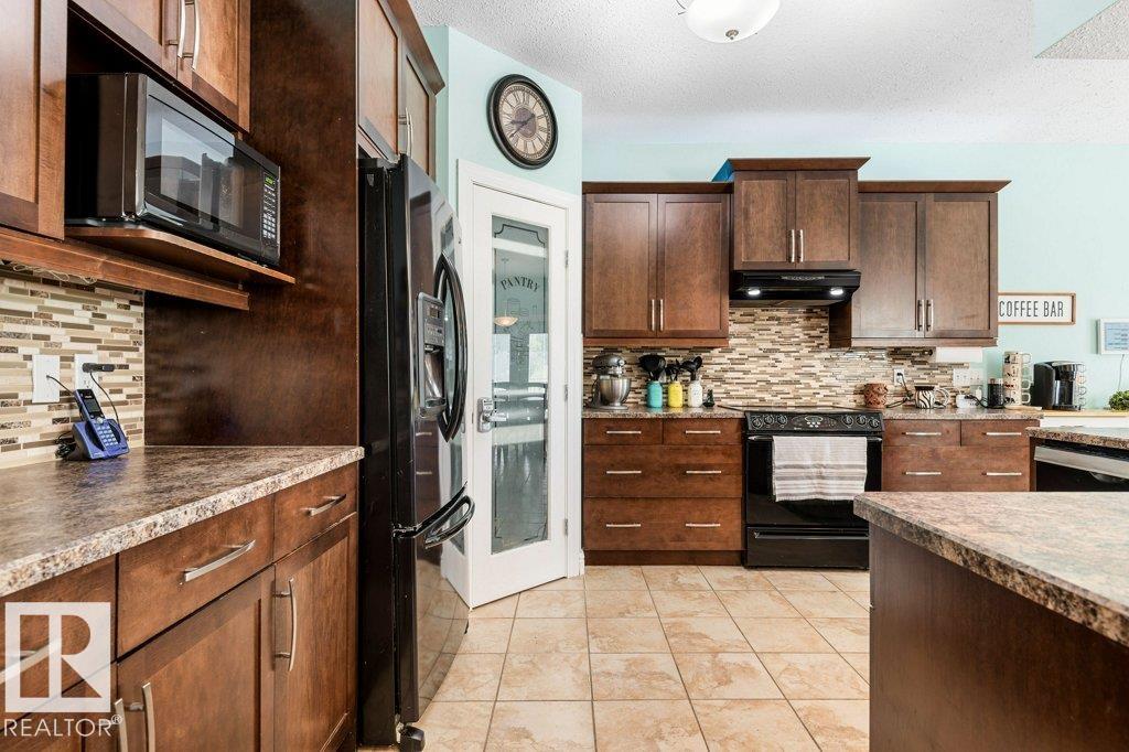 Photo 20 at 110, 51022 Range Road 221, Pebble Court Estates, Rural Strathcona County