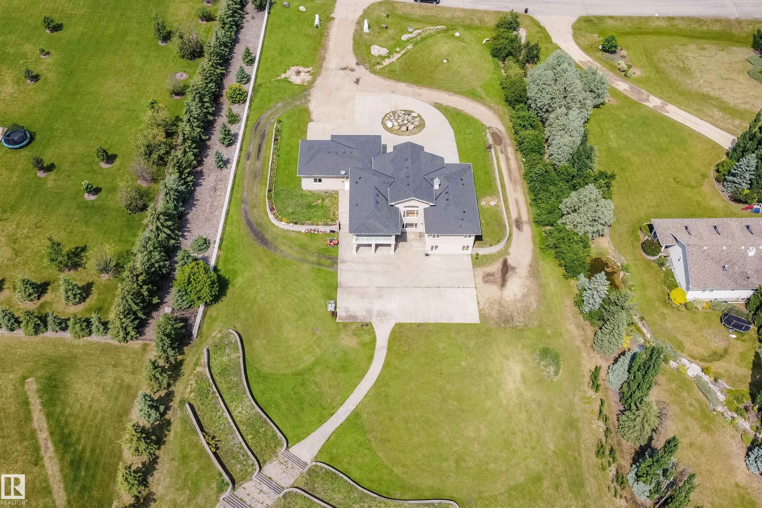 Photo 60 at 15 - 53016 Rge Road 222, Four Ridges, Rural Strathcona County