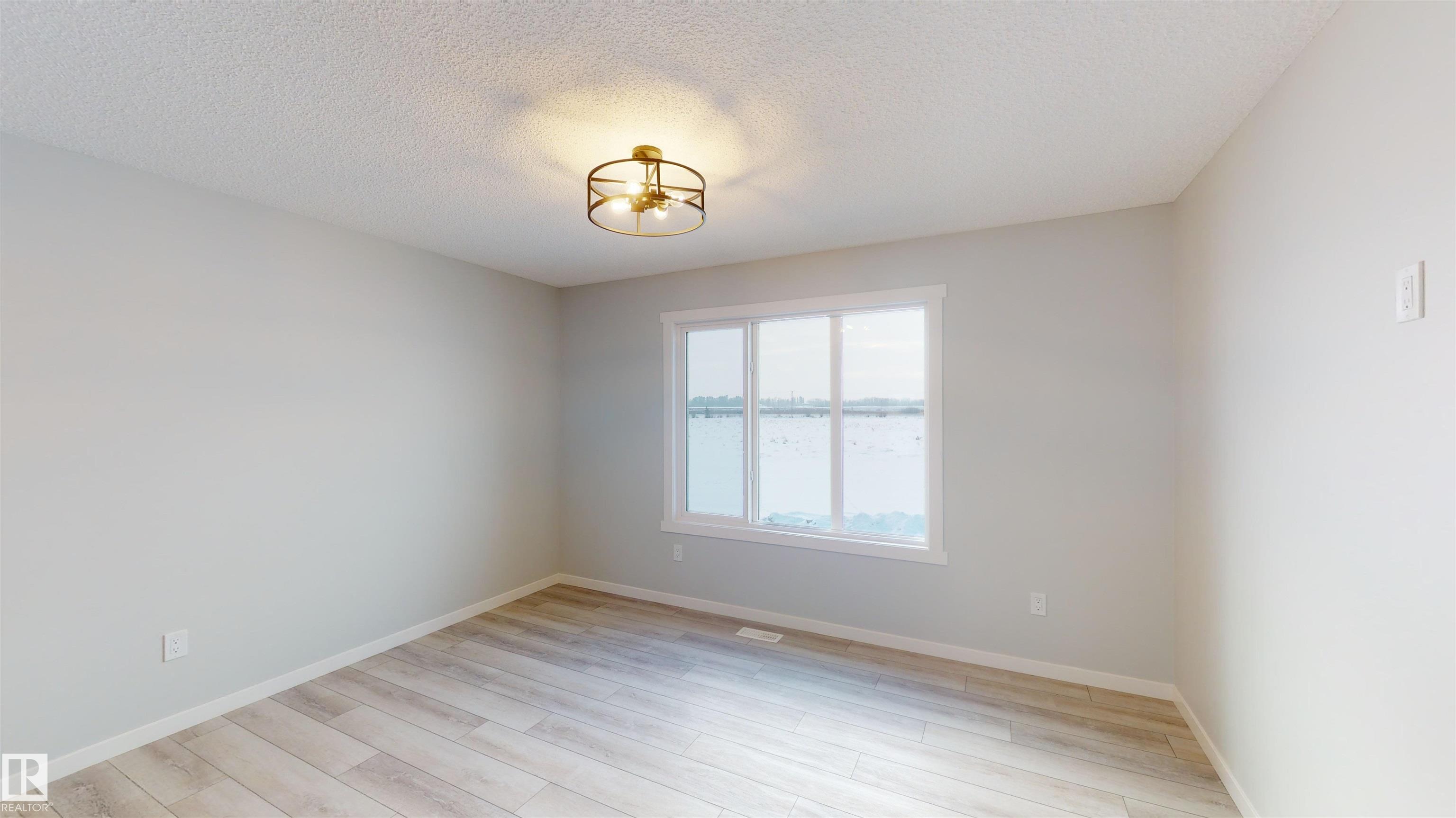 Photo 2 at 30 Elizabeth gardens, Easton, Spruce Grove