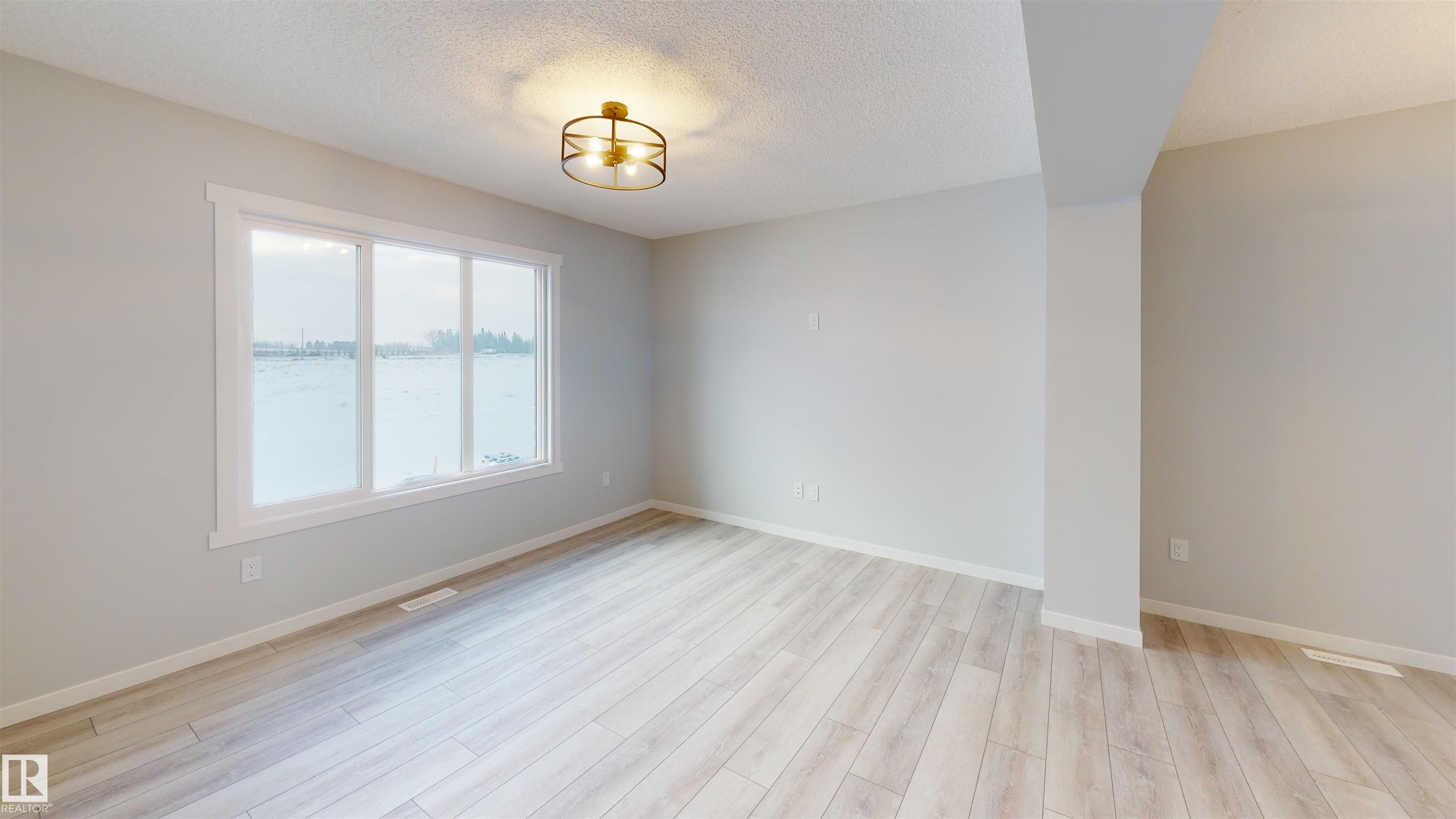 Photo 4 at 30 Elizabeth gardens, Easton, Spruce Grove