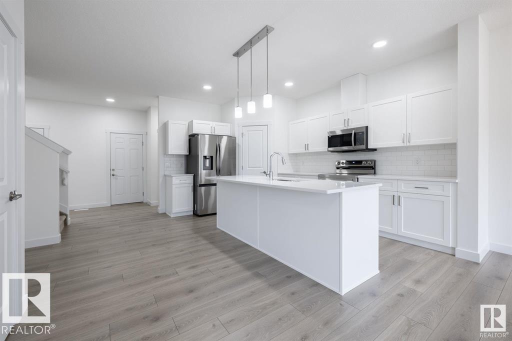 Photo 11 at 129 Elm Street, Westpark, Fort Saskatchewan