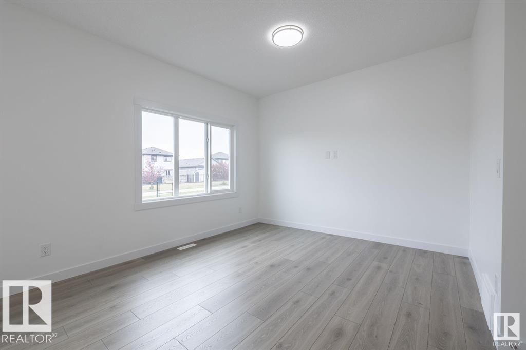 Photo 10 at 129 Elm Street, Westpark, Fort Saskatchewan