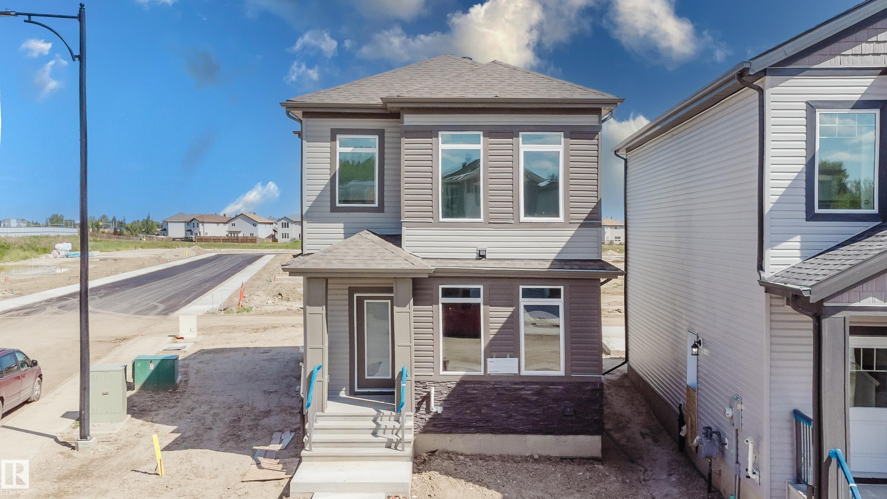 Photo 2 at 261 Munn Way, Meadowview Park, Leduc