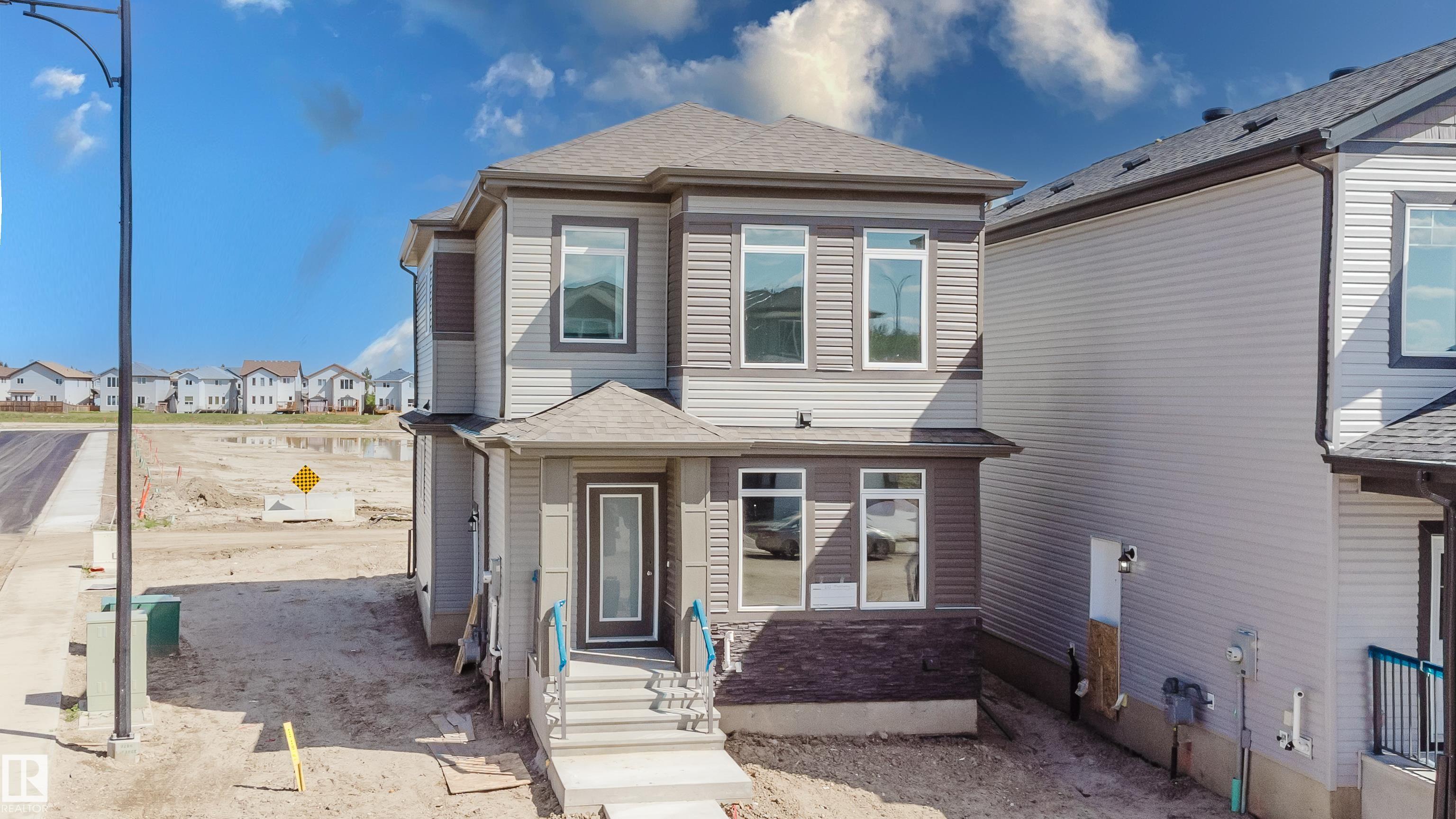 Photo 3 at 261 Munn Way, Meadowview Park, Leduc