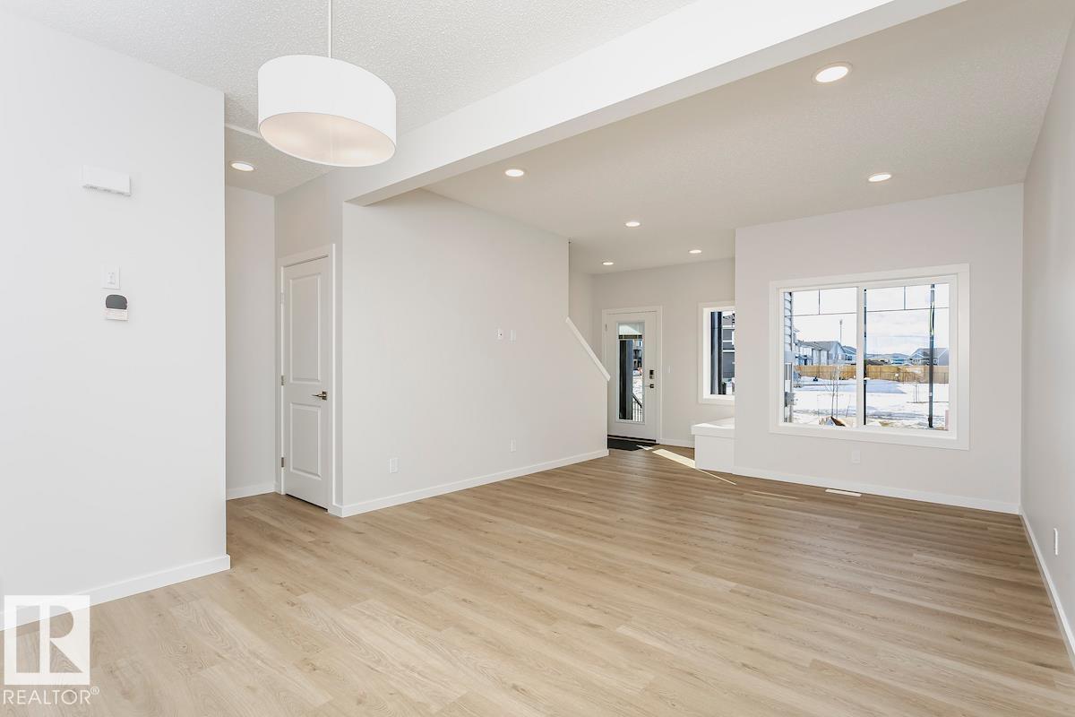 Photo 3 at 310 Hawthorn Way, Woodbend, Leduc