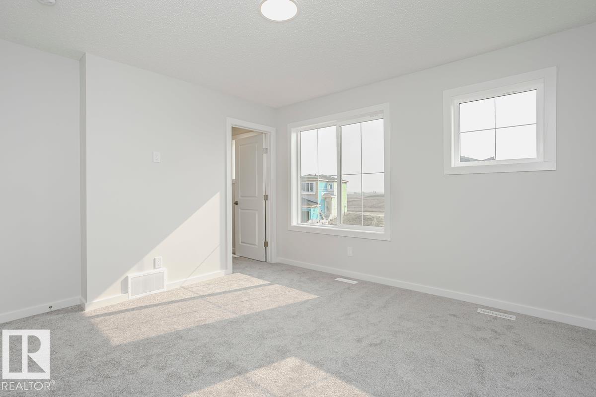 Photo 8 at 310 Hawthorn Way, Woodbend, Leduc