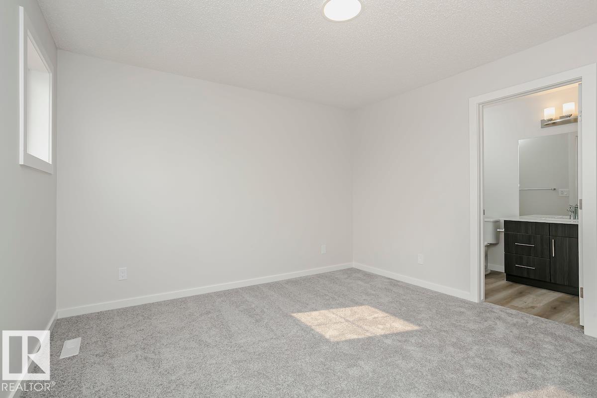 Photo 9 at 310 Hawthorn Way, Woodbend, Leduc
