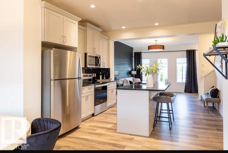 Photo 3 at 92 Dansereau Way, Dansereau Meadows, Beaumont