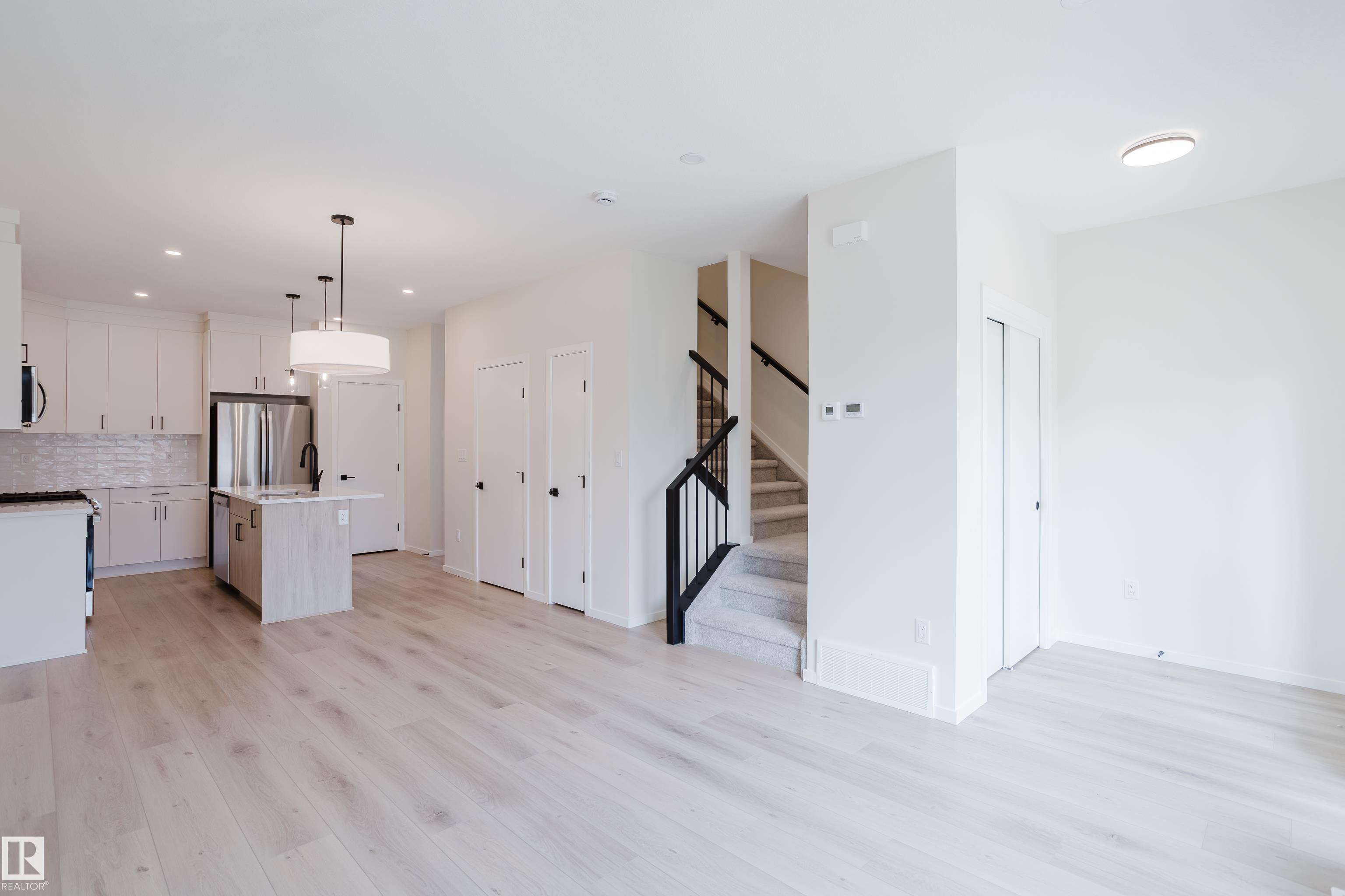 Photo 3 at 10463/65/67/69 159 Street NW, Britannia Youngstown, Edmonton