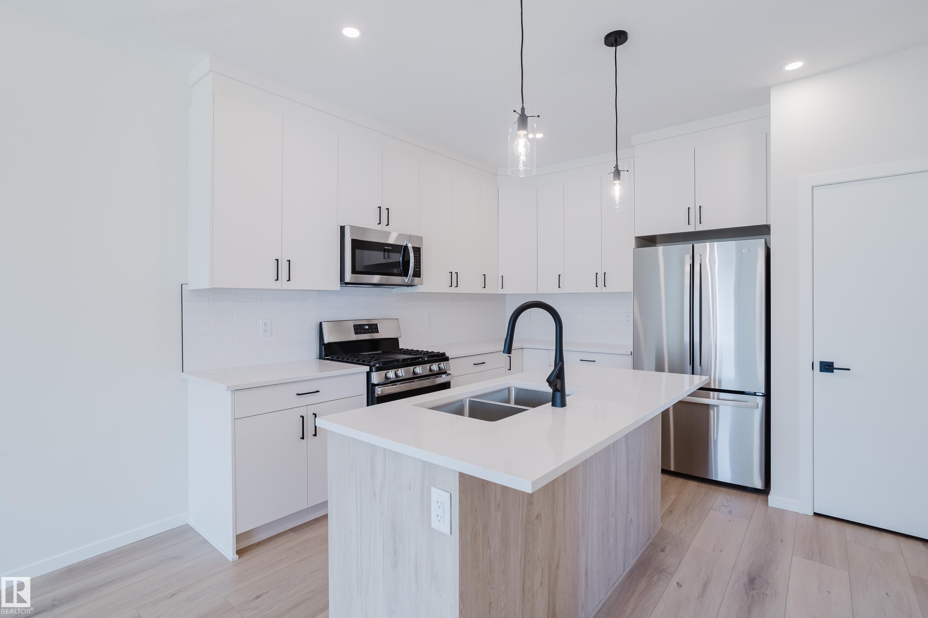 Photo 5 at 10463/65/67/69 159 Street NW, Britannia Youngstown, Edmonton