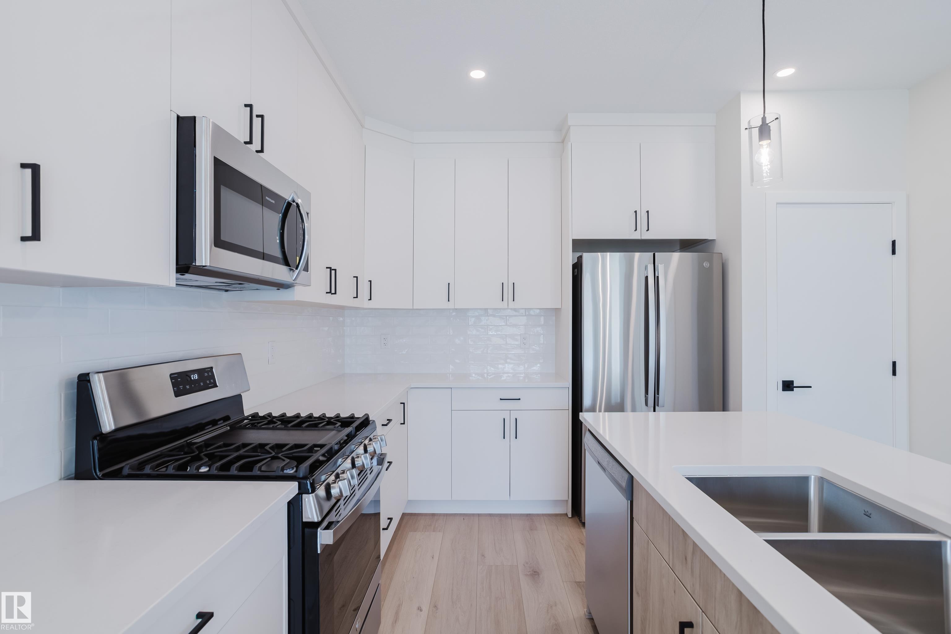 Photo 9 at 10463/65/67/69 159 Street NW, Britannia Youngstown, Edmonton