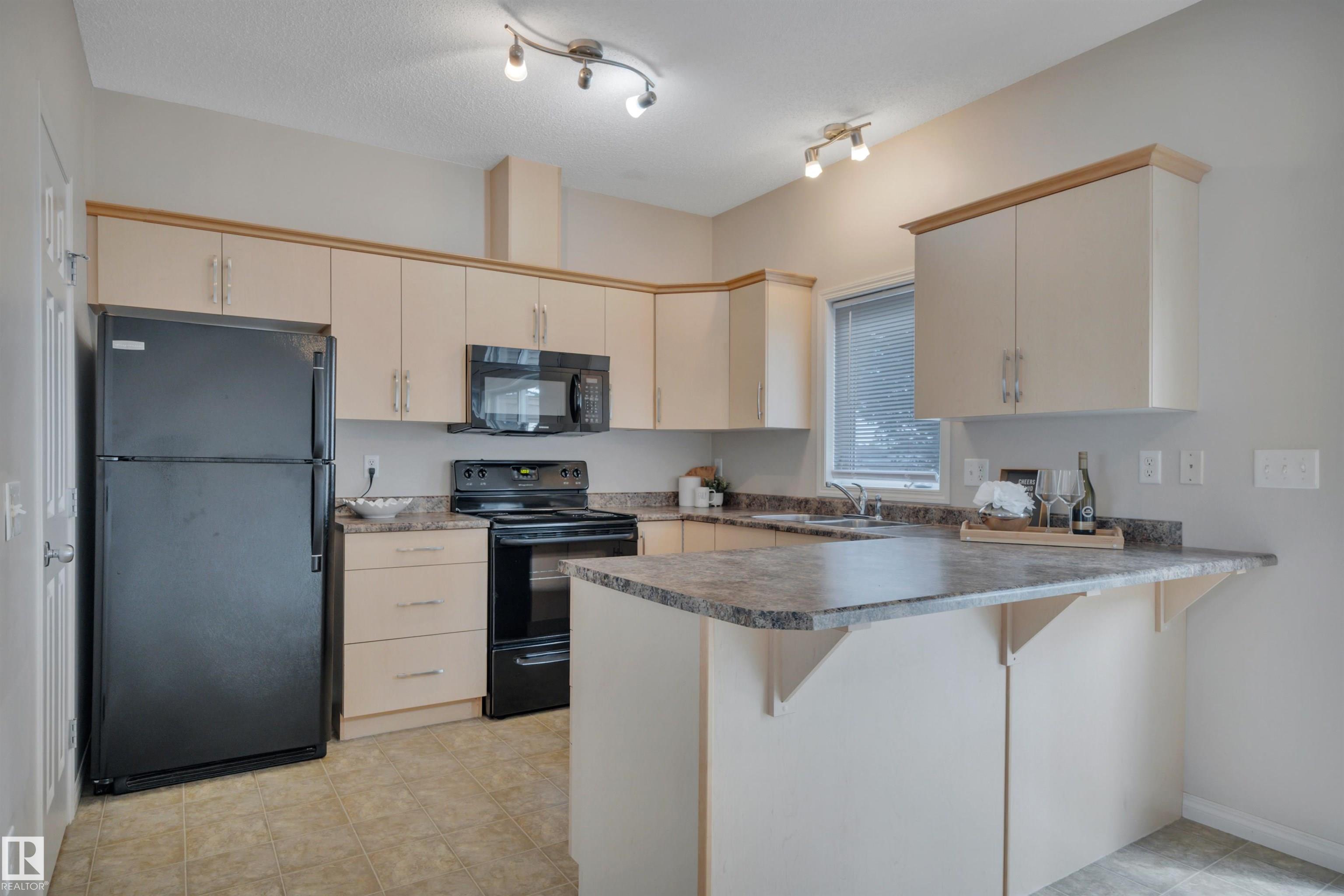 Photo 12 at 2 - 5102 30 Avenue, Place Chaleureuse, Beaumont