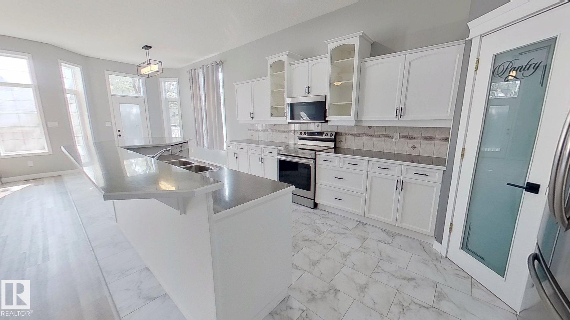 Photo 3 at 29 Rue Bouchard, Citadel Ridge, Beaumont