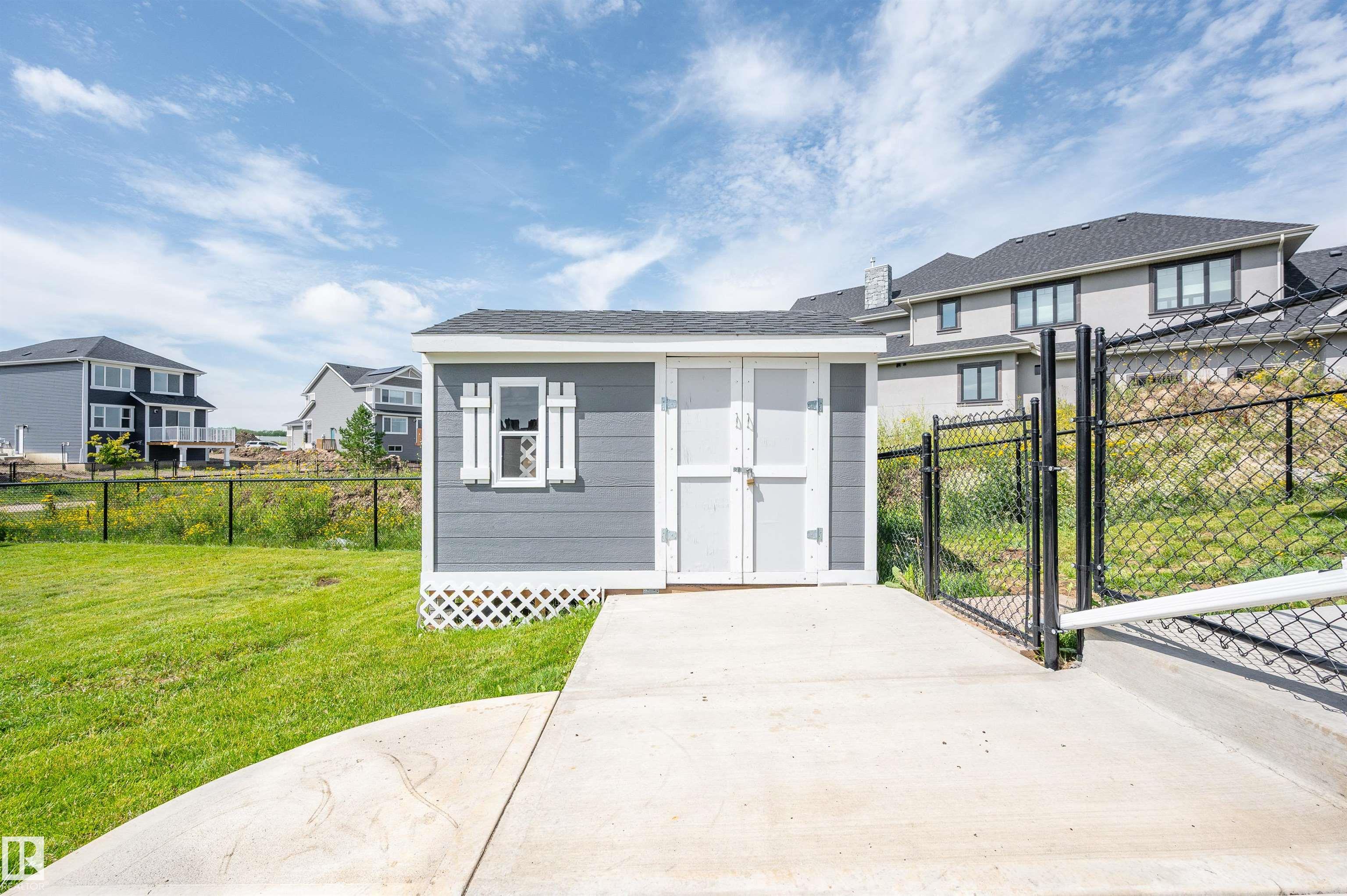 Photo 66 at 134 Edgewater Circle, Southfork, Leduc