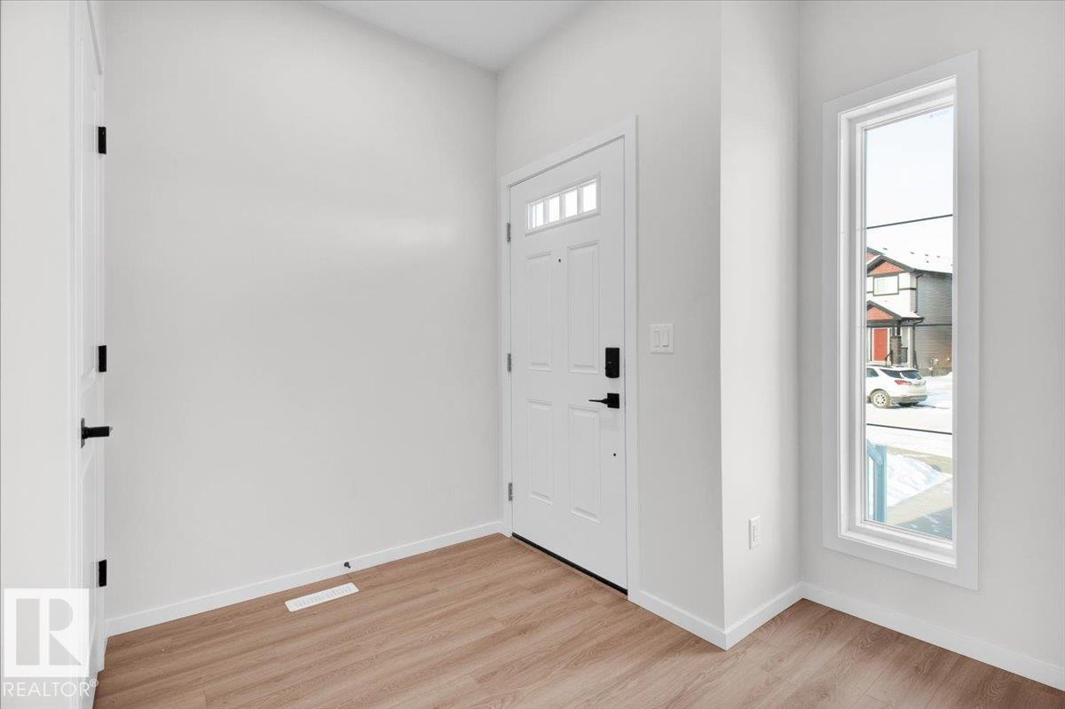 Photo 2 at 107 Brickyard Drive, Brickyard, Stony Plain