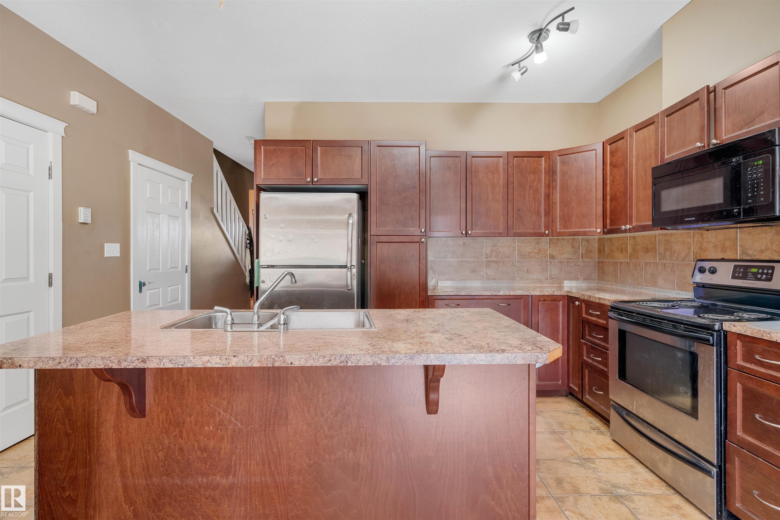Photo 7 at 109 Sandstone Estates, Sandstone, Stony Plain
