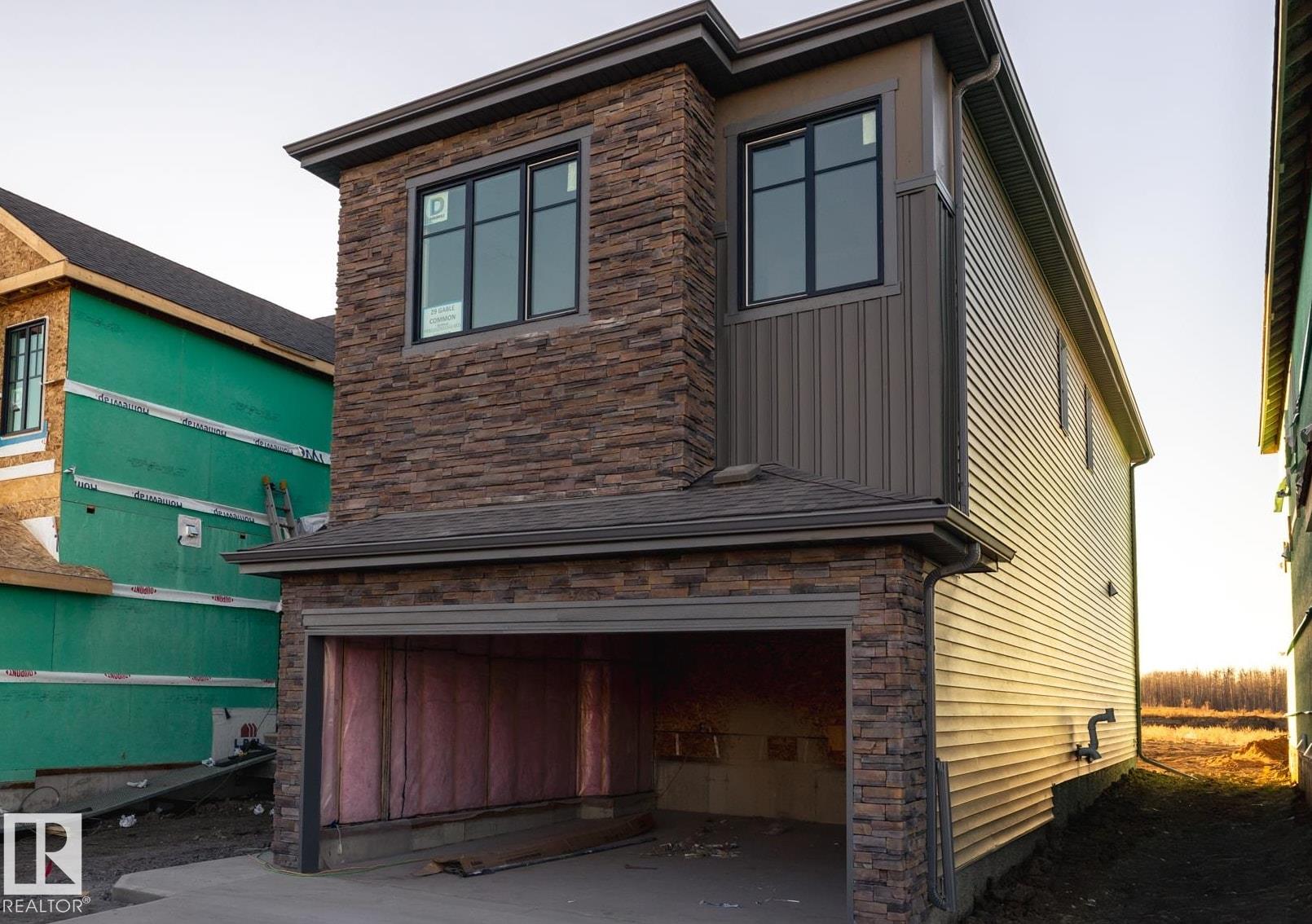 Enjoy the convenience and the charm of Greenbury?with it's convenient location close to all of your favourite amenities like parks, rec centres, schools, and all the more! Experience comfort, style, and community living with the Brattle 22 from Akash Homes! This thoughtfully designed home features 3 spacious bedrooms, 2.5 bathrooms, and 9' ceilings on the main floor that enhance the open-concept layout. The modern kitchen boasts sleek quartz countertops and a convenient walkthrough pantry, perfect for everyday living and entertaining. Upstairs, you'll have a spacious bonus room, laundry room with sink, and the primary suite offers a private retreat with an ensuite bath! Two additional bedrooms and a full bath complete the space for the whole family. Enjoy the convenience of a double attached garage, and a SEPARATE SIDE ENTRANCE!