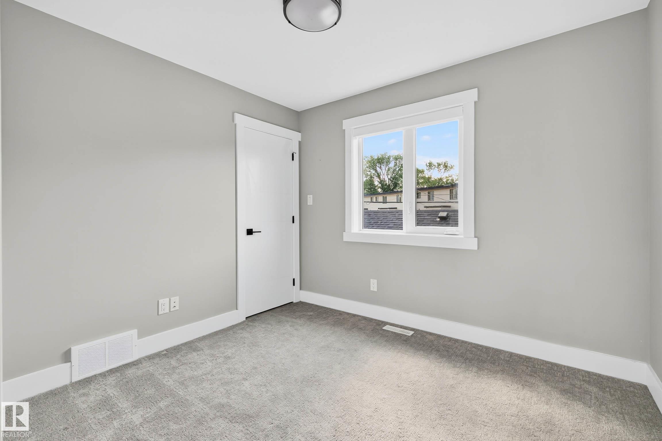 Photo 16 at 8805 Strathearn Drive NW, Strathearn, Edmonton