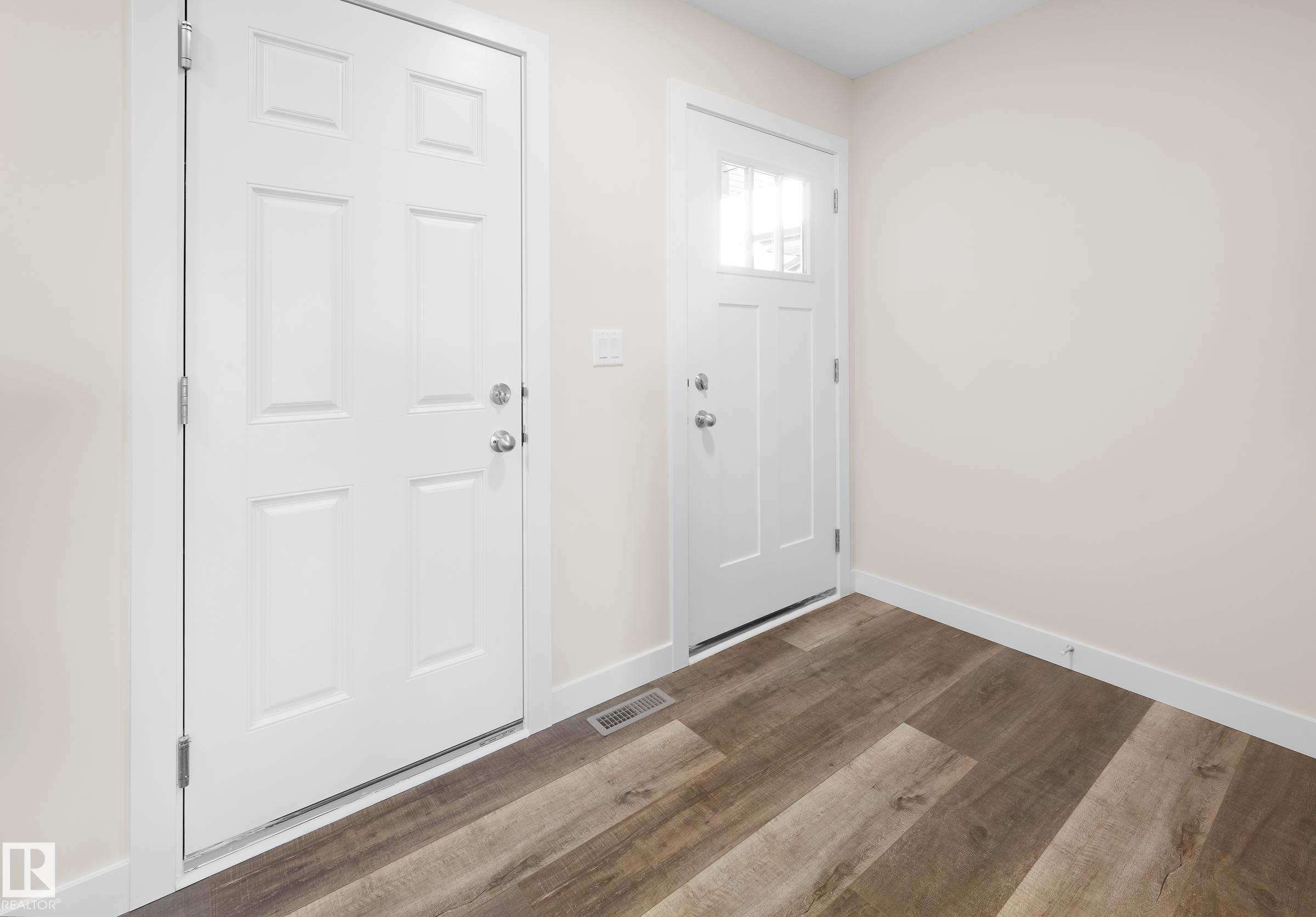 Photo 2 at 752 Berg Loop, Black Stone, Leduc
