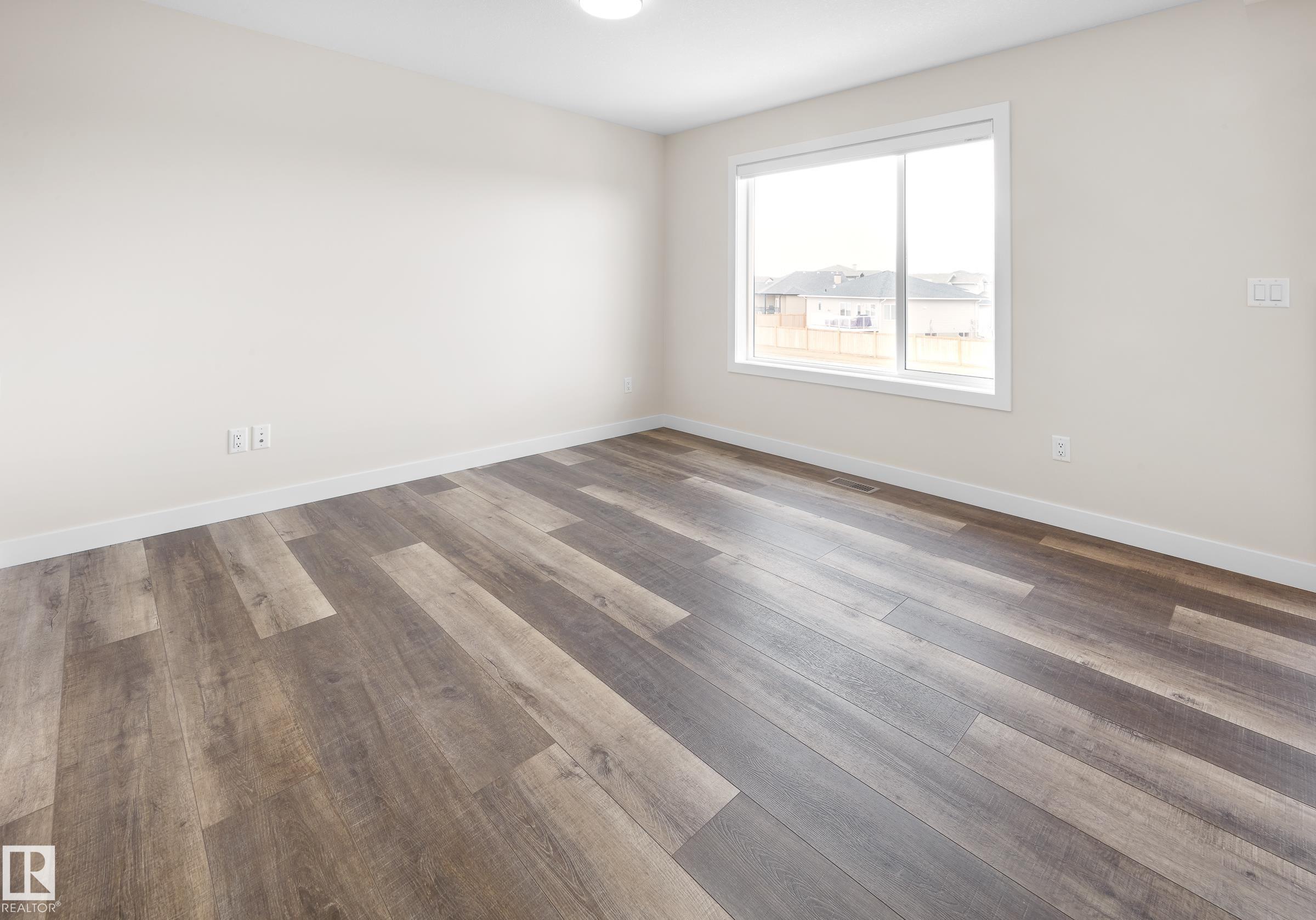 Photo 7 at 752 Berg Loop, Black Stone, Leduc