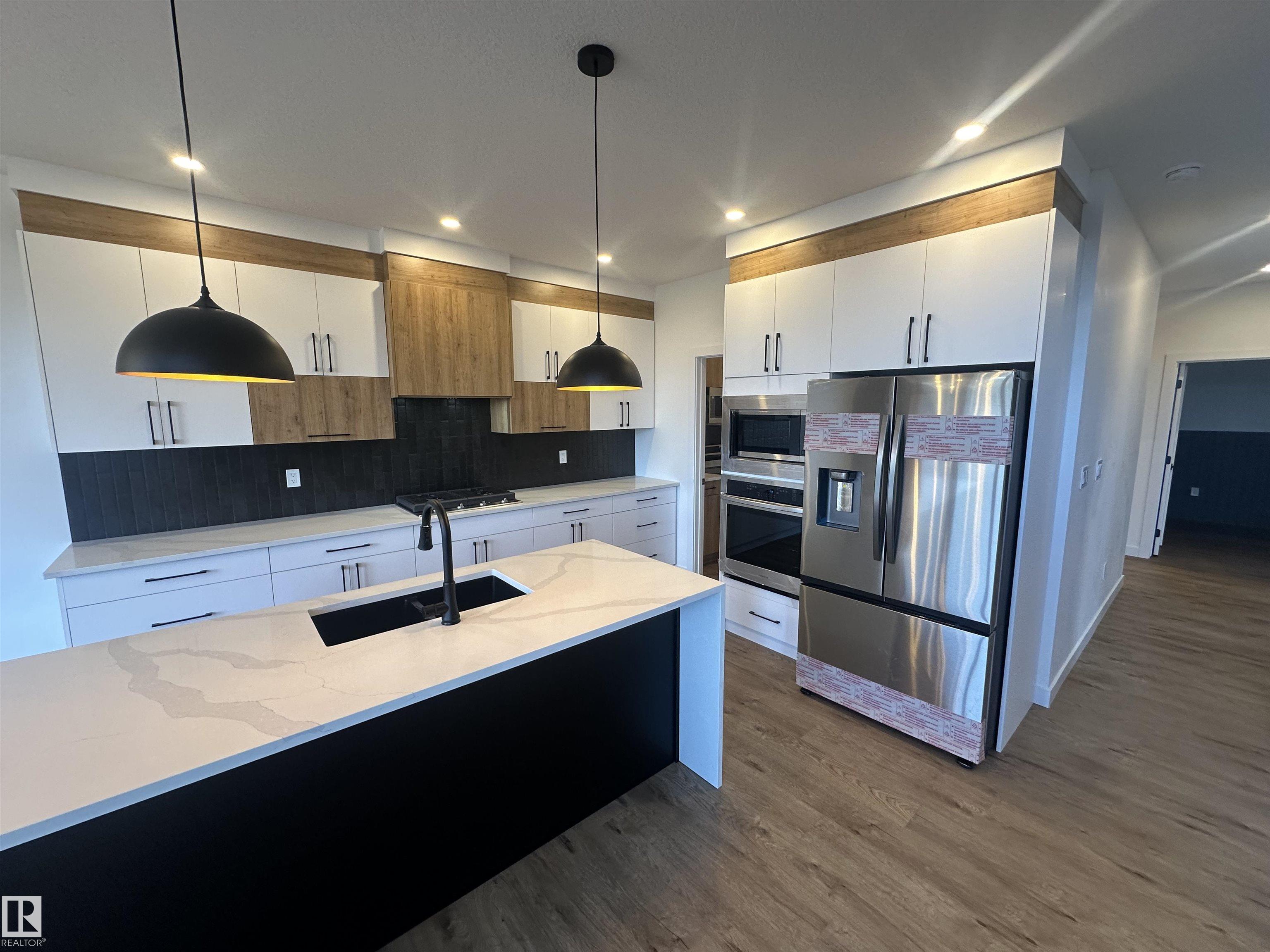 Photo 5 at 205 Kettyl Court, West Haven Park, Leduc