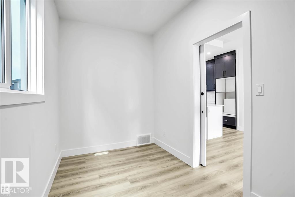 Photo 3 at 20 Resplendent Way, Riverside, St. Albert