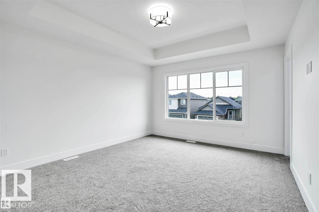 Photo 4 at 20 Resplendent Way, Riverside, St. Albert