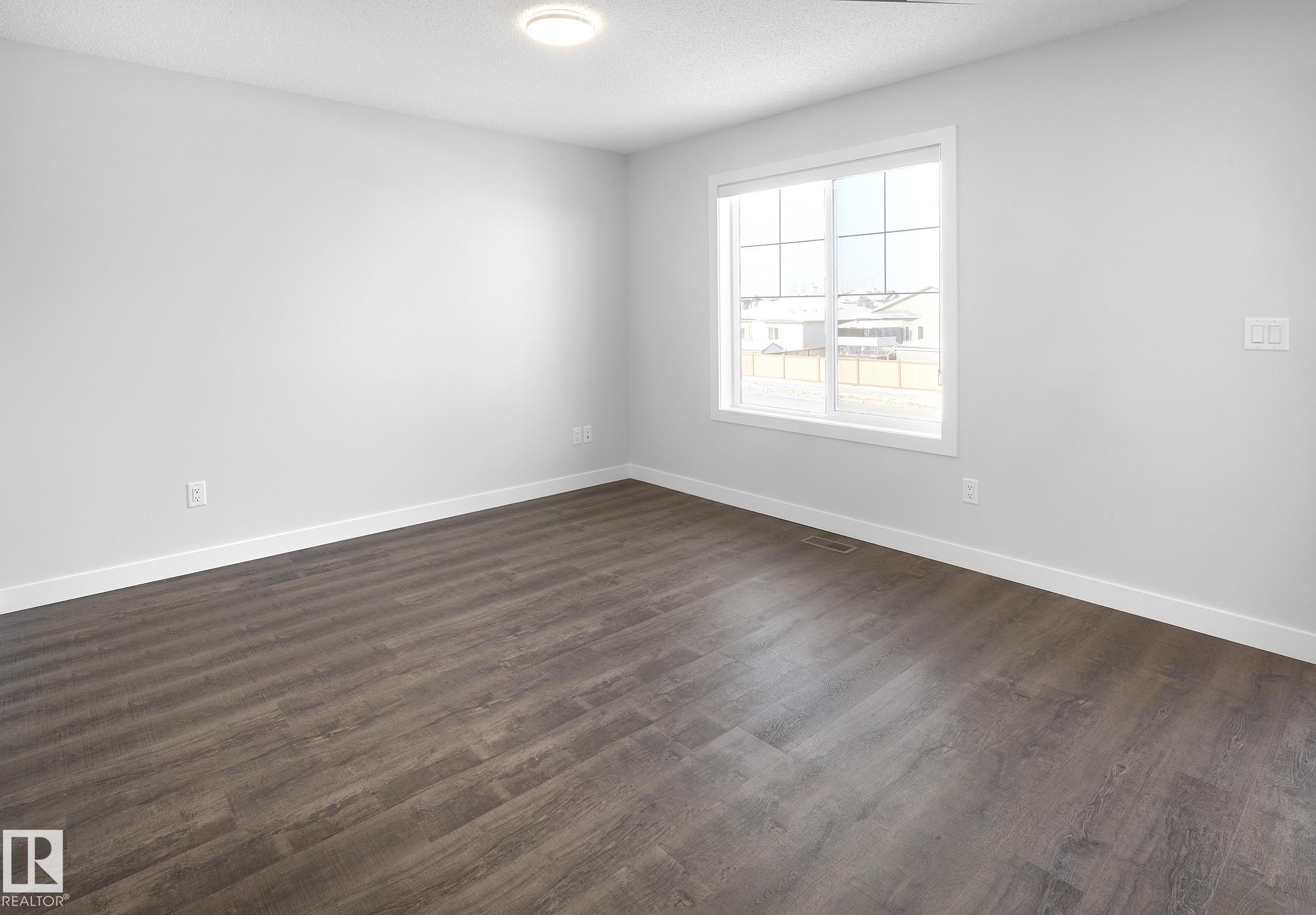 Photo 11 at 760 Berg Loop, Black Stone, Leduc