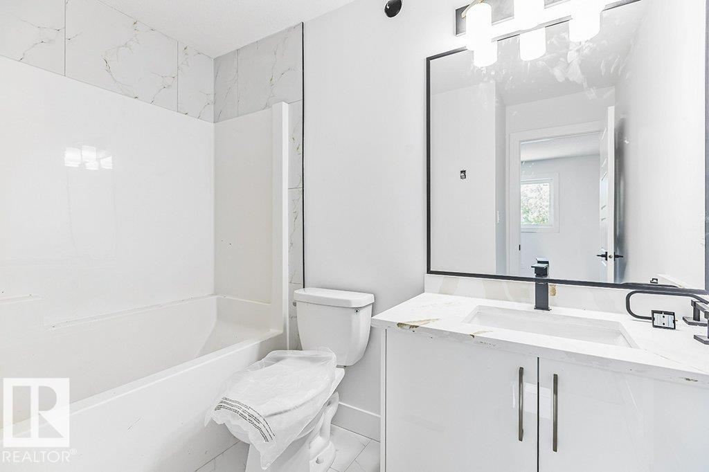 Photo 11 at 63 Silverstone Drive, Silverstone, Stony Plain