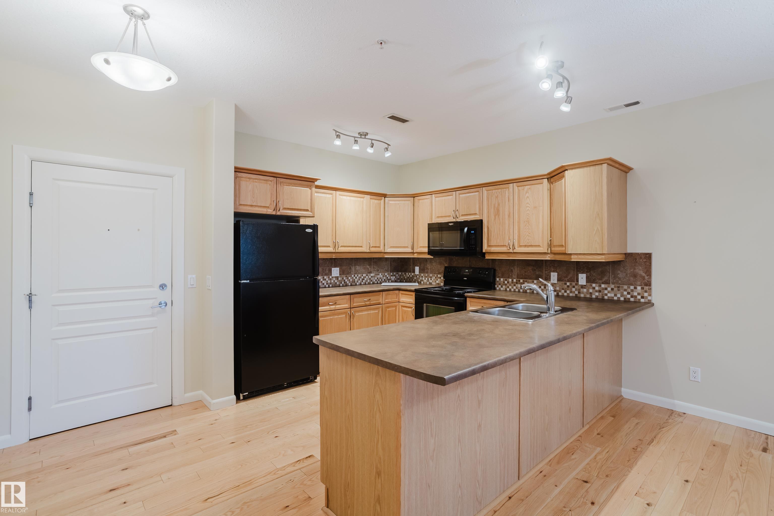 Photo 3 at 409 - 160 Magrath Road NW, Magrath Heights, Edmonton