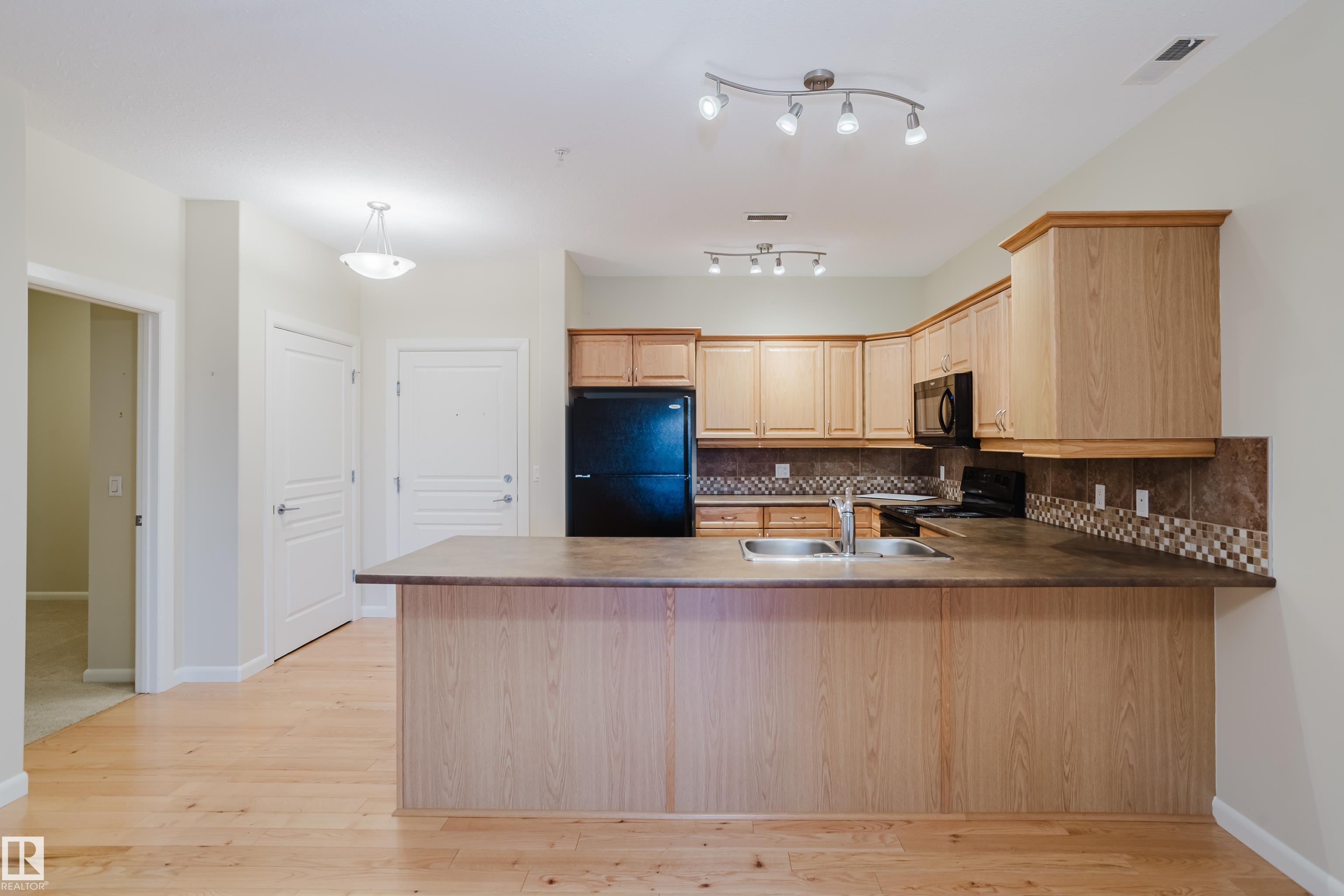 Photo 4 at 409 - 160 Magrath Road NW, Magrath Heights, Edmonton
