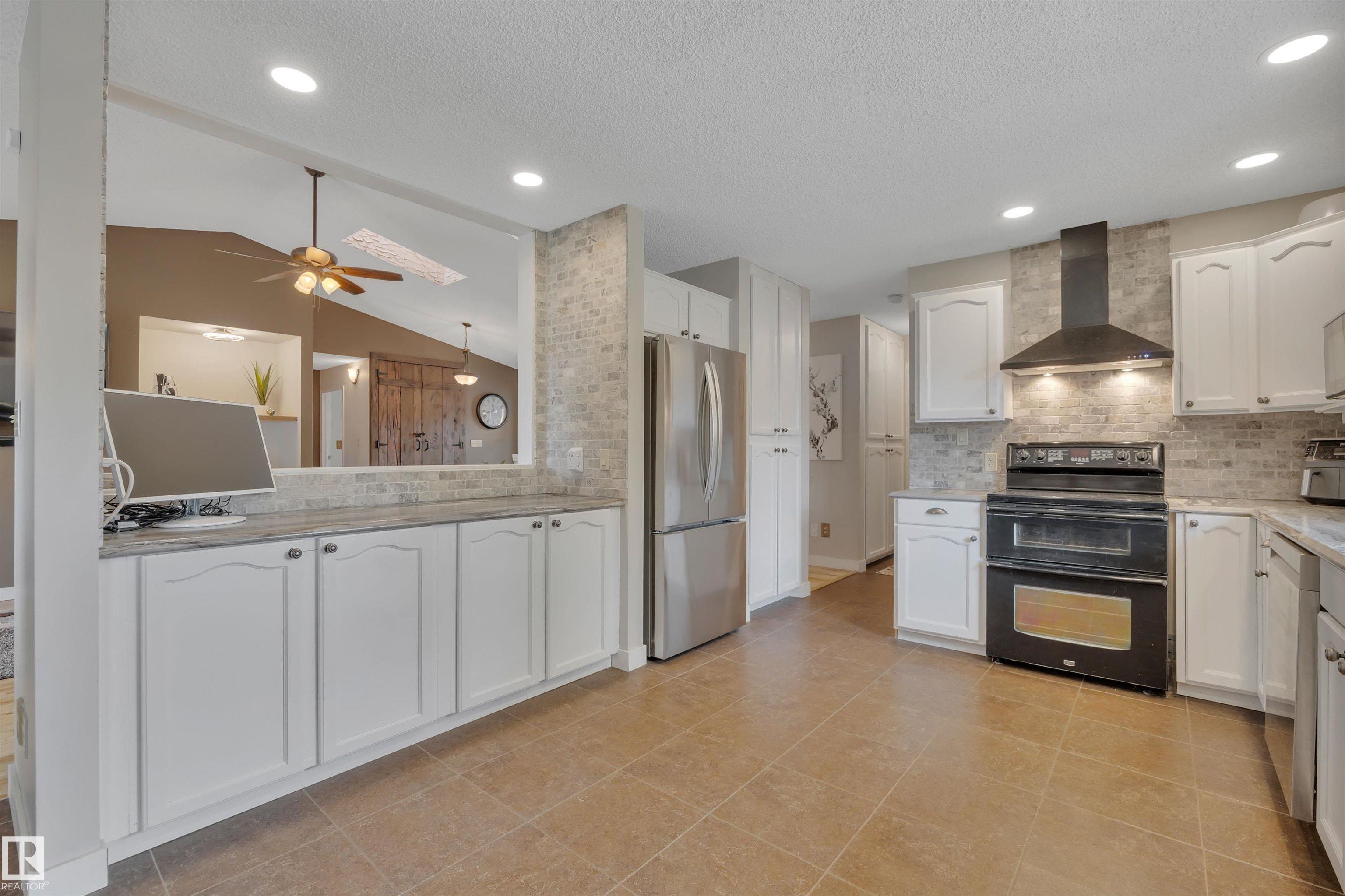 Photo 17 at 7 Fieldstone Cove, Fieldstone, Spruce Grove