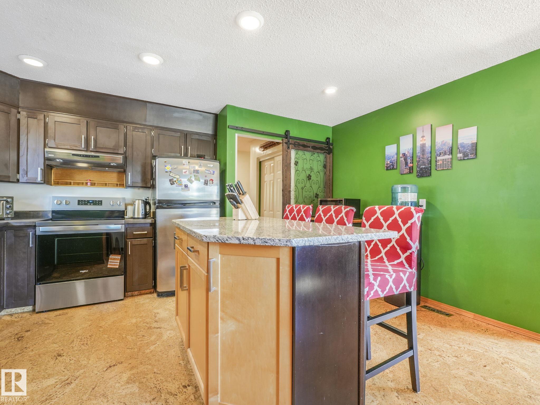 Photo 8 at 3608 15 Avenue NW, Crawford Plains, Edmonton