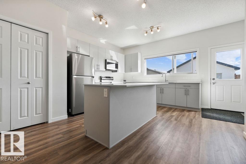 Photo 12 at 7123 46a Street, Le Reve, Beaumont