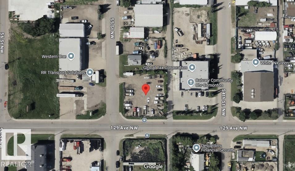 INDUSTRIAL CORNER LOT in Kennedale.  Excellent opportunity to build to suit or use as it is.  LOT DIMENSIONS 131.9 sq. ft. x 123.1 sq. ft. Currently had development permit approved for MINOR INDUSTRIAL USE. Great opportunity for development and or owner operator use.