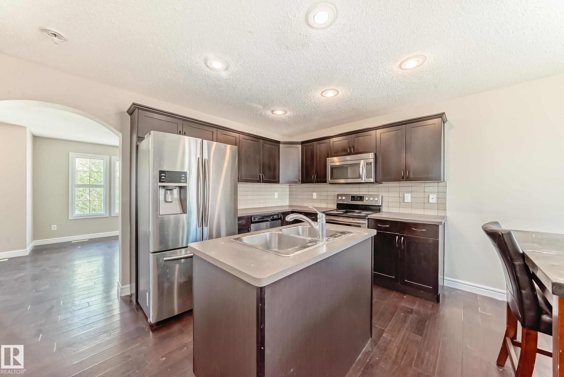 Photo 3 at 1553 33a Street NW, Laurel, Edmonton