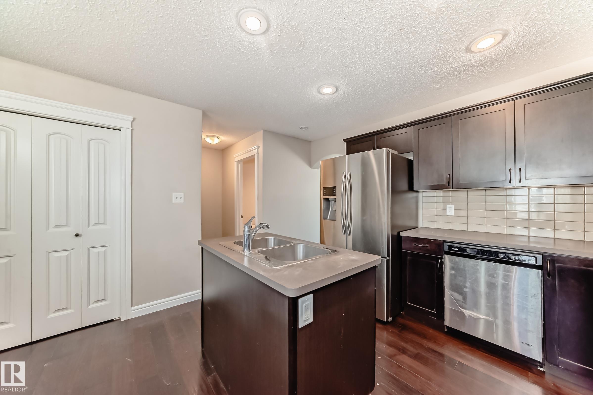 Photo 7 at 1553 33a Street NW, Laurel, Edmonton