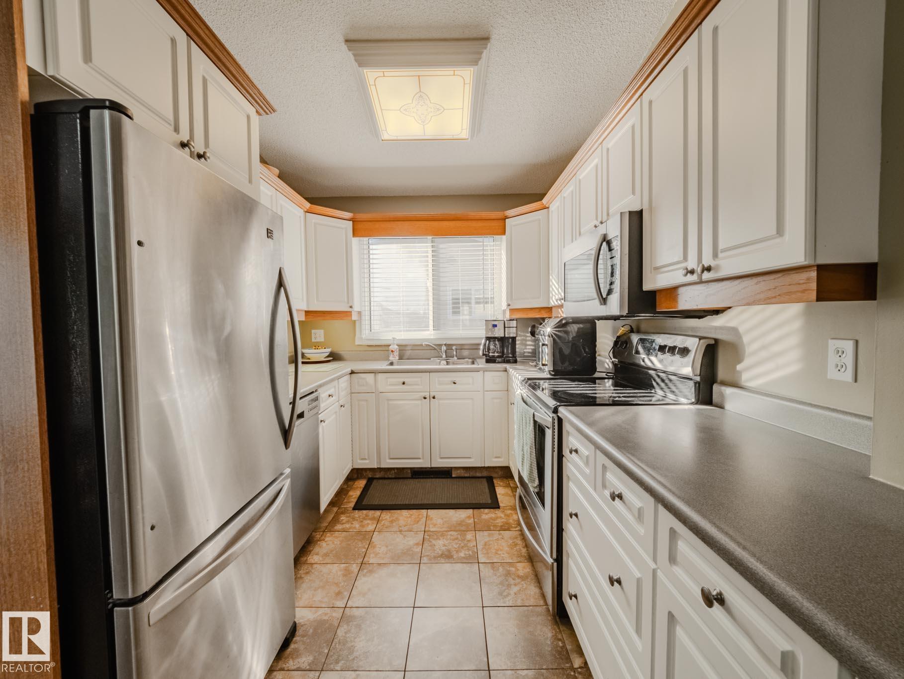 Photo 12 at 50 Flagstone Crescent, Forest Lawn, St. Albert