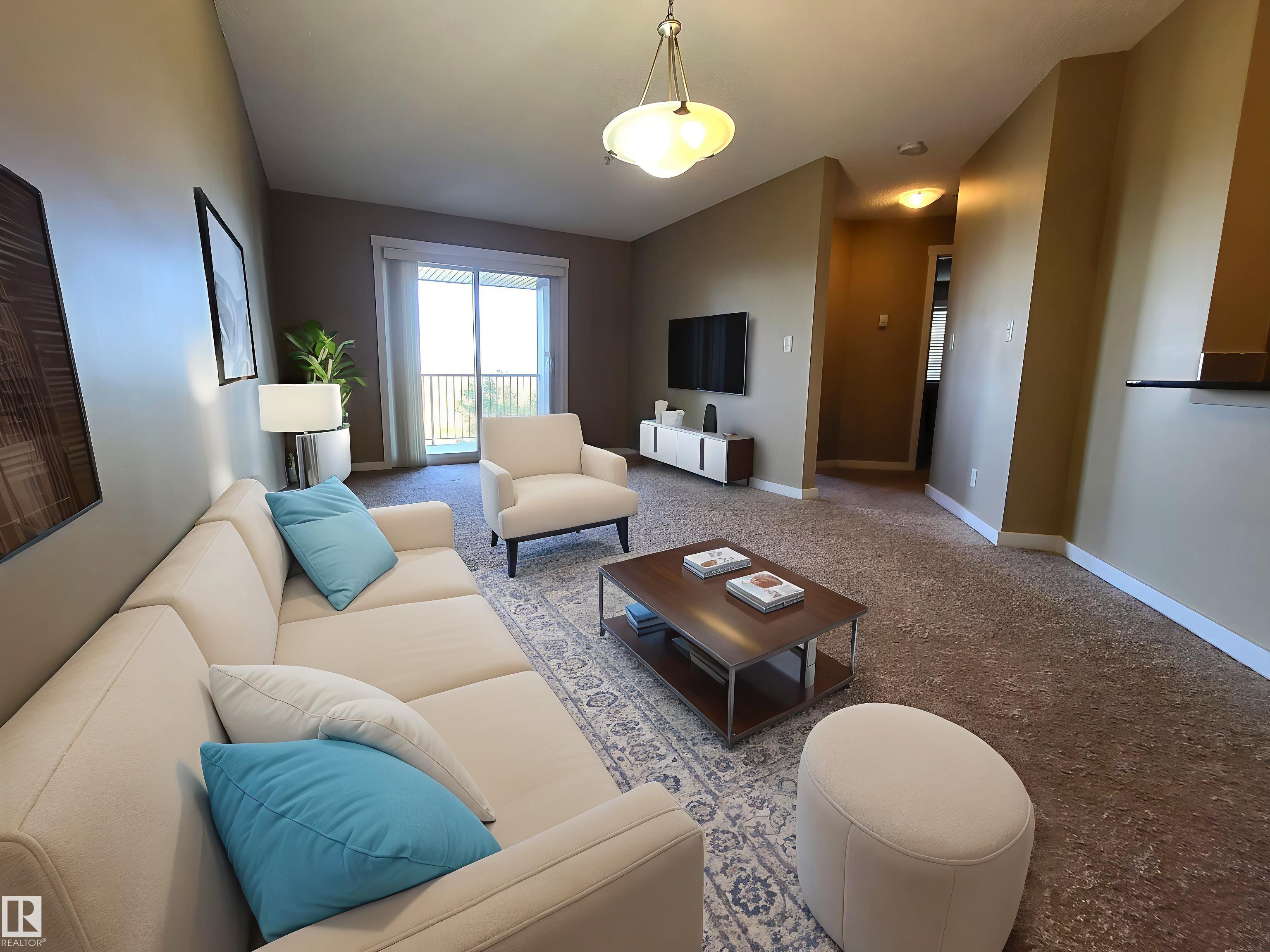 Discover modern elegance and unparalleled convenience in this breathtaking 2-bedroom, 1-bathroom condo nestled in the vibrant Aurora Greens community of South Edmonton. Perfectly positioned on the third floor with serene views of lush green space, this open-concept gem combines sophisticated design, premium finishes, and a prime location to offer a lifestyle of comfort and ease. With low condo fees that include heat and water, underground parking, and a well-managed building, this move-in-ready home is ideal for first-time buyers, young professionals, or savvy investors seeking a turnkey property in one of Edmonton?s most sought-after neighborhoods.  The unit offers a huge balcony, rough in for future A/C, ceiling fan in the master, granite countertops, dark caramel cabinets, stainless appliances, stacked in suite laundry, bidet, and new flooring throughout.  This one is a beauty!
