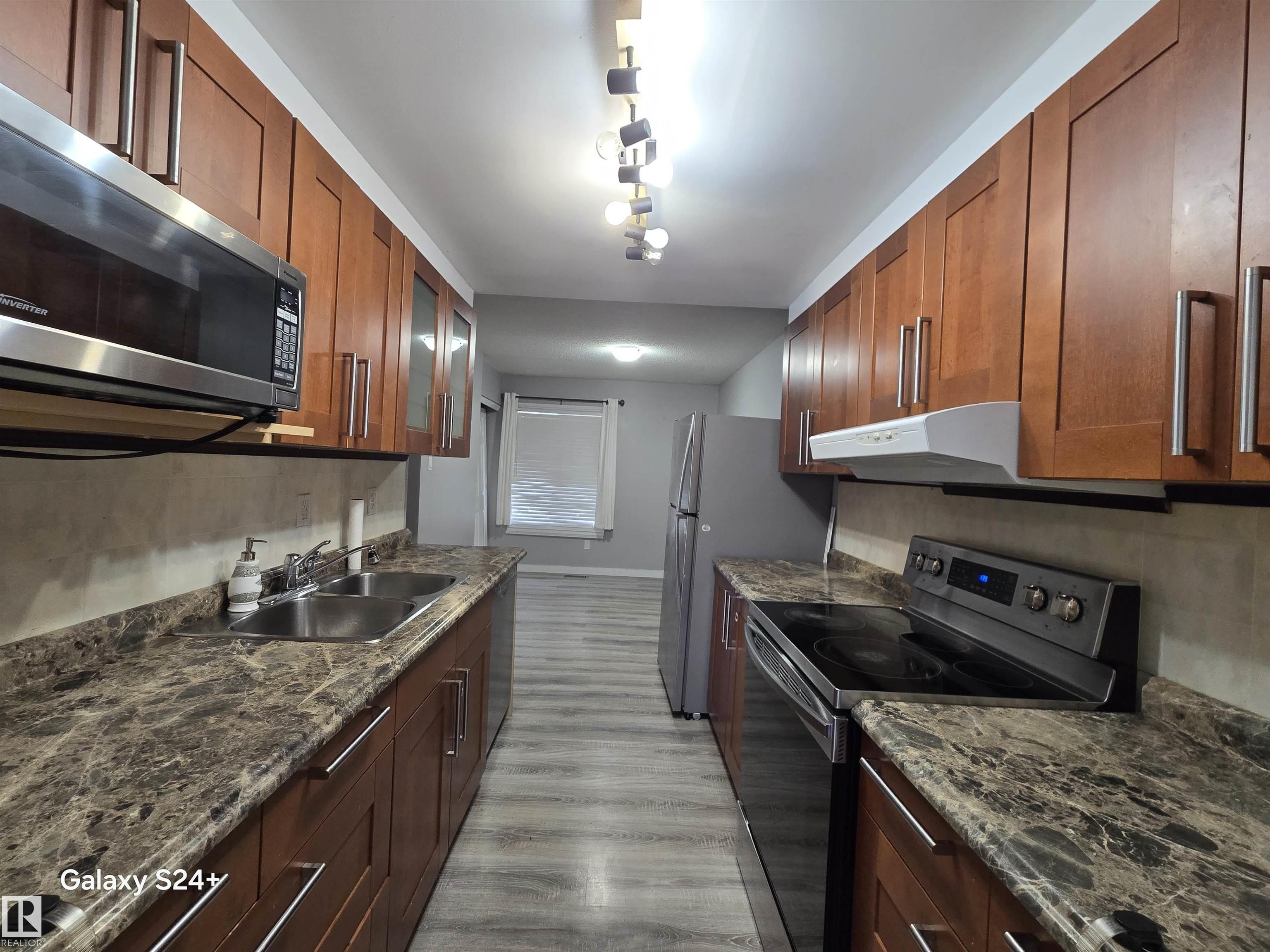 $10,000+10,000 price reduction from $240,000. Located opposite Duggan school, a Daycare, playground and public transportation. A senior home is also just opposite it. Very suitable and convenient for families with small school going kids. Sky hills is also not too far. Bus stop is just few meters away. Very well maintained and cared for. Main level consists Kitchen, dining area, living room and a half Washroom.  Upper level: 3 Bedrooms. Basement: A huge family room, utilities room.