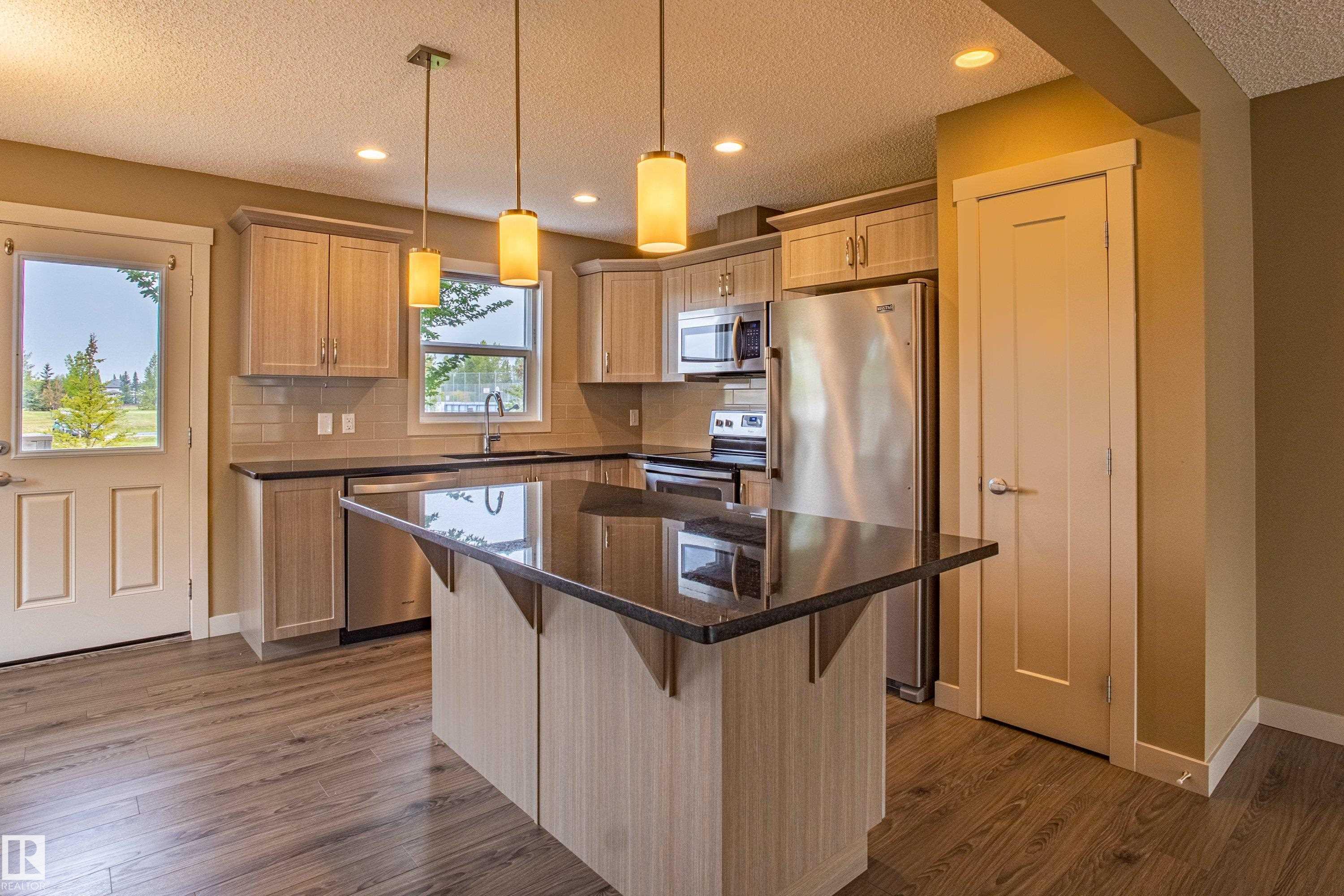 Photo 14 at 32 - 2121 Haddow Drive NW, Haddow, Edmonton