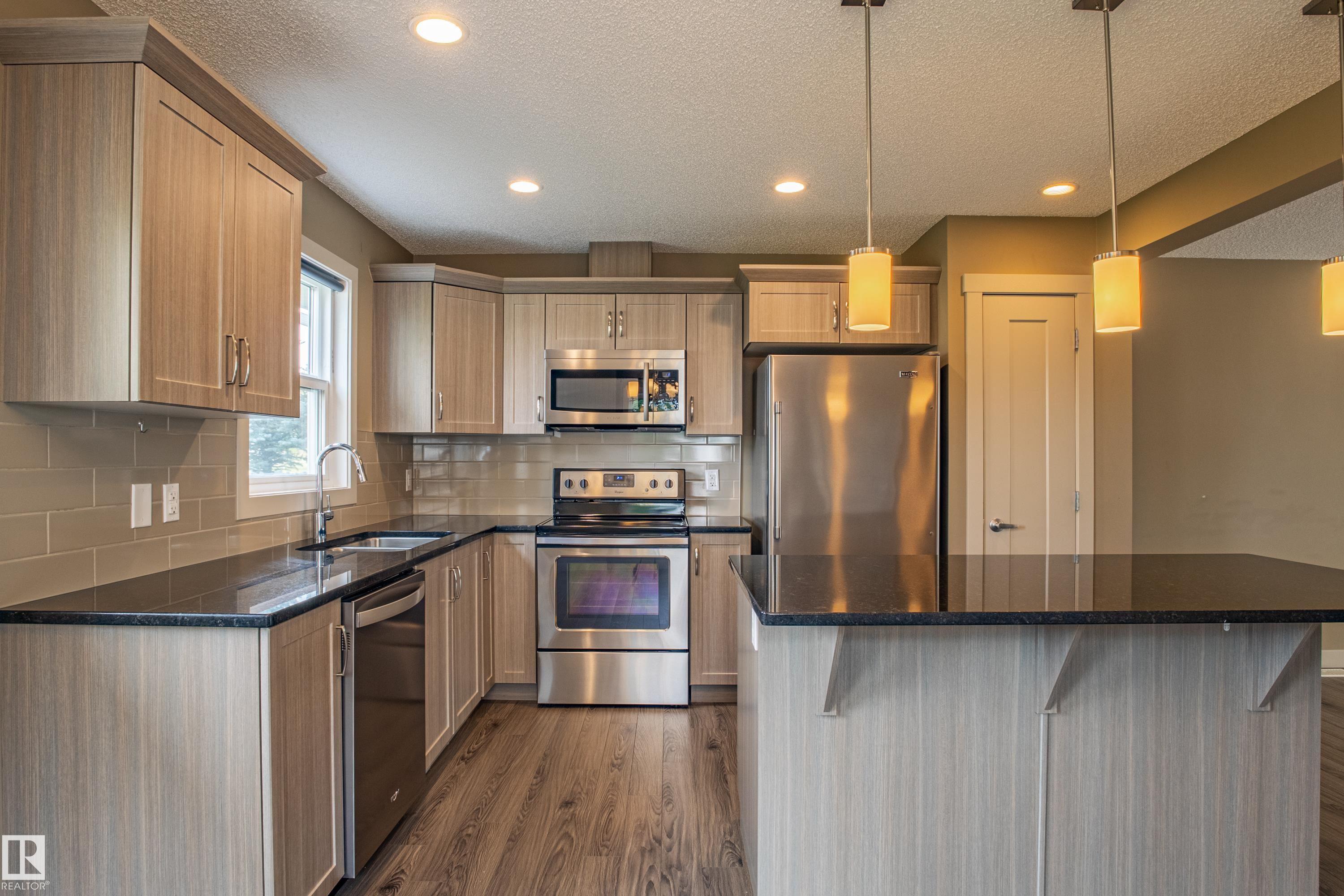 Photo 17 at 32 - 2121 Haddow Drive NW, Haddow, Edmonton