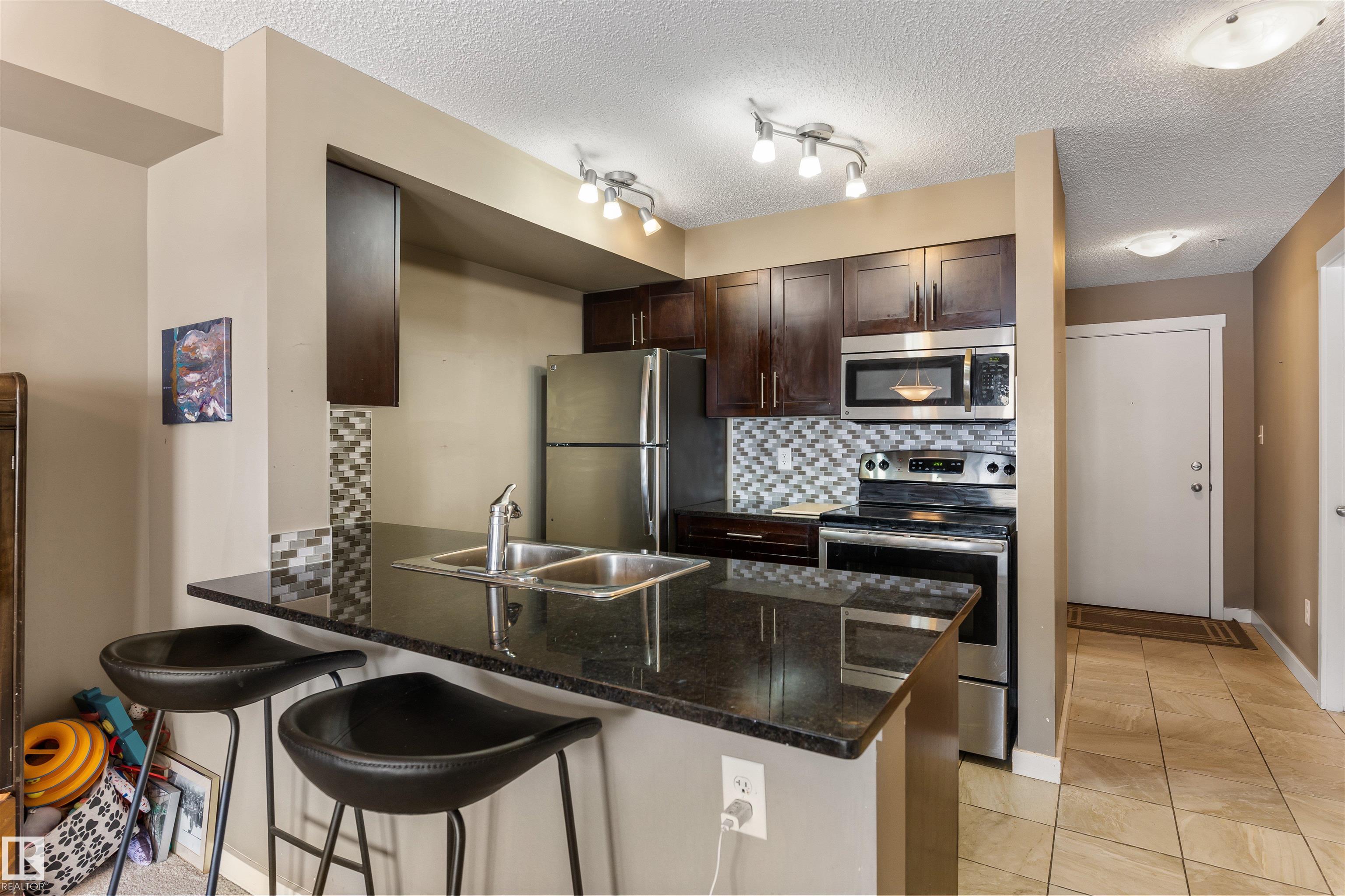 Photo 3 at 104 - 25 Element Drive, Erin Ridge North, St. Albert